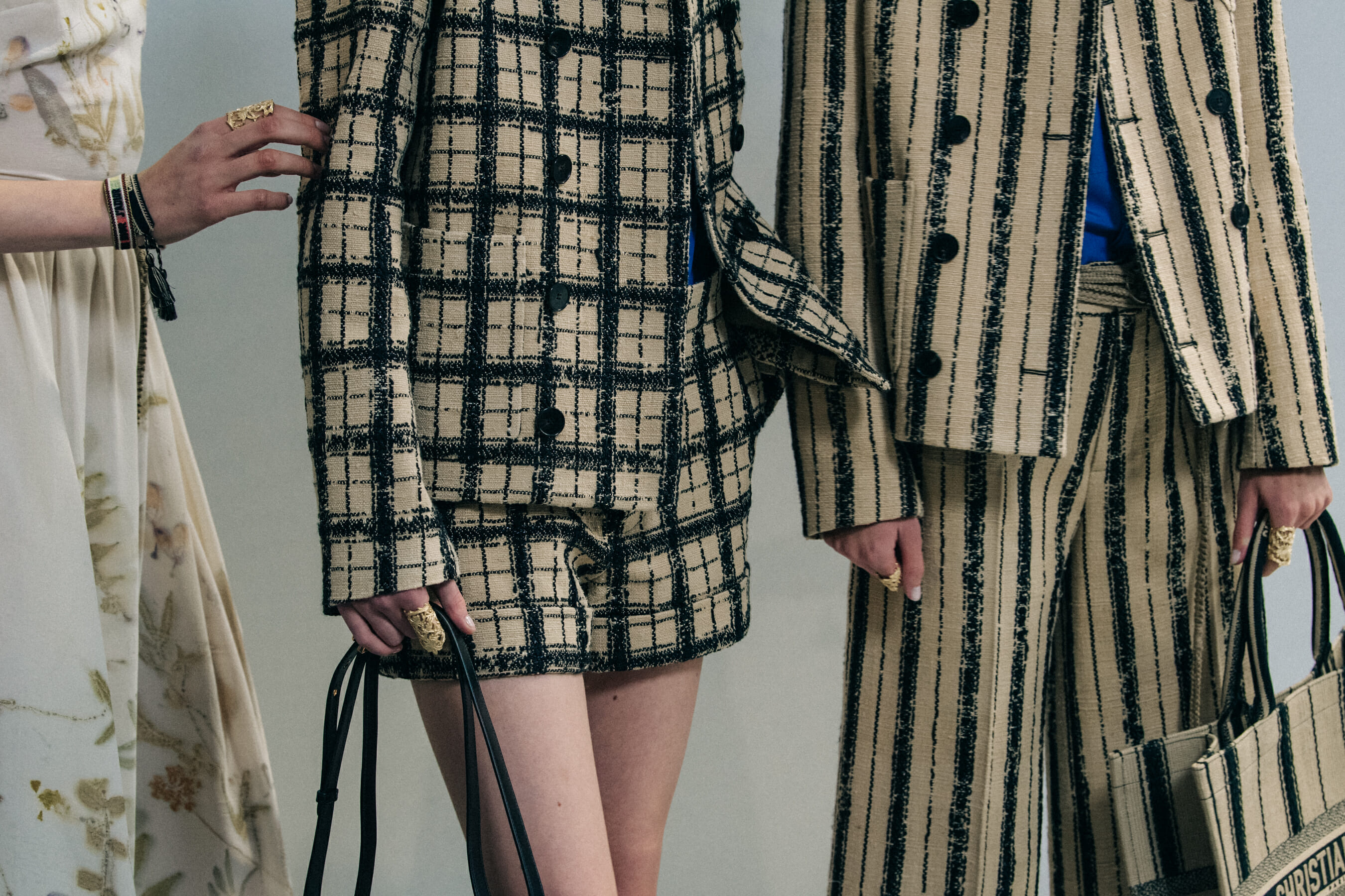 Models wearing striped outfits at Christian Dior