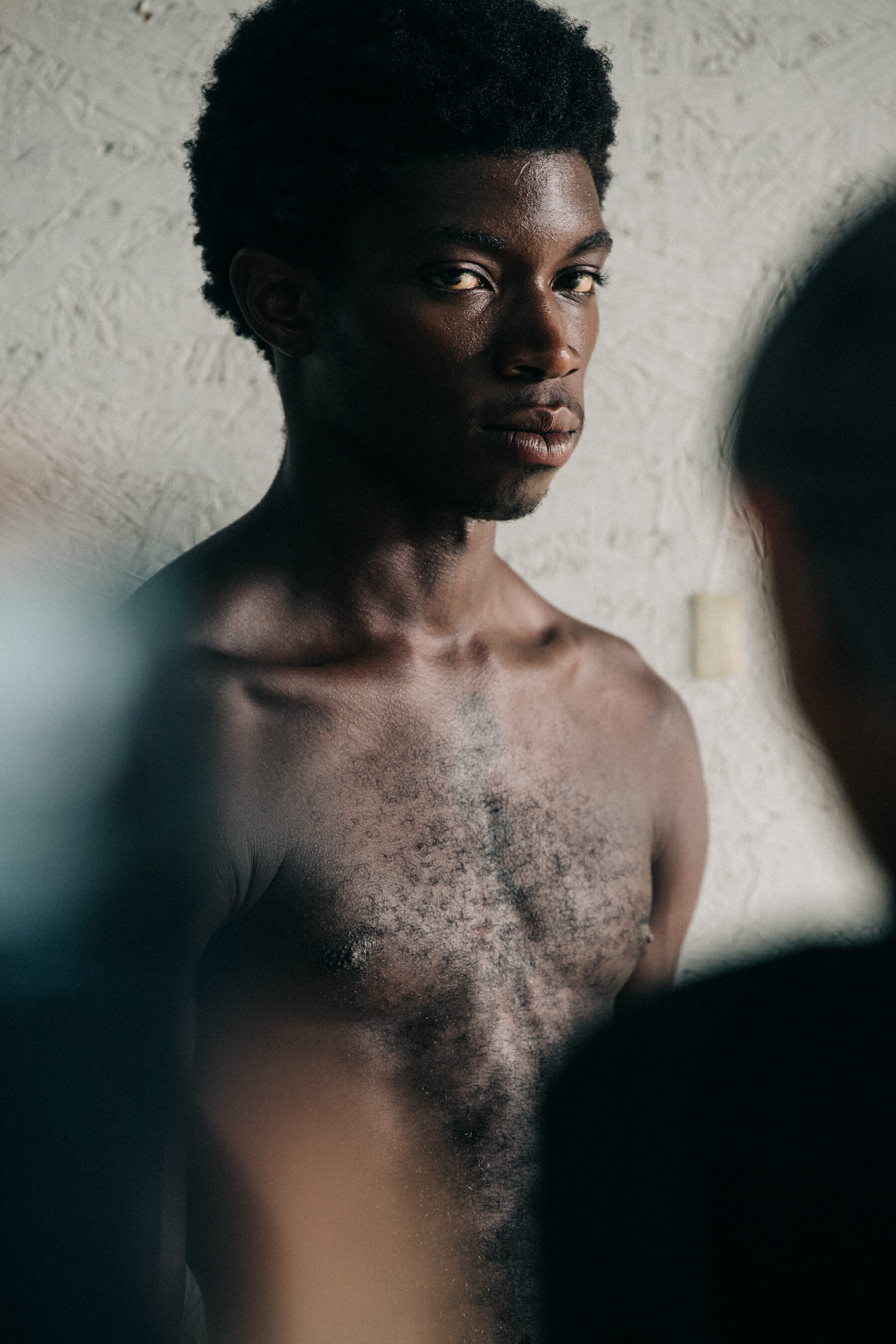 Topless model at Eckhaus Latta