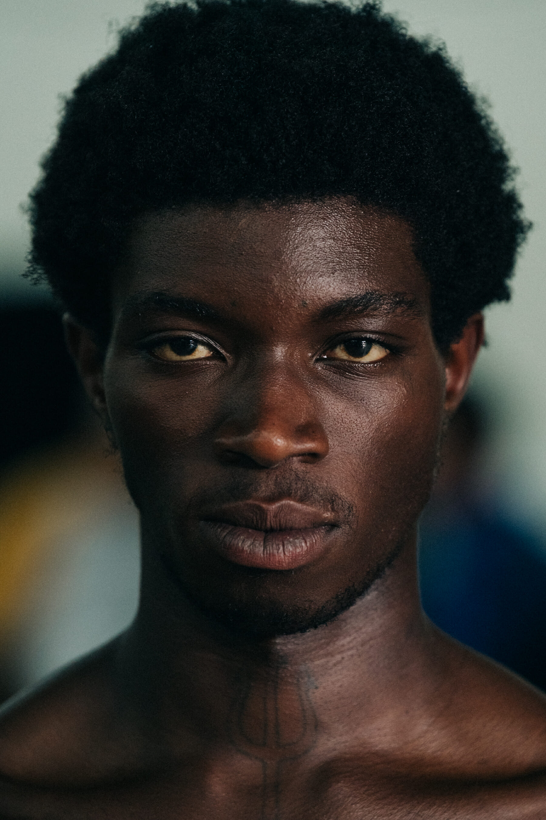 Portrait of model with thick black hair