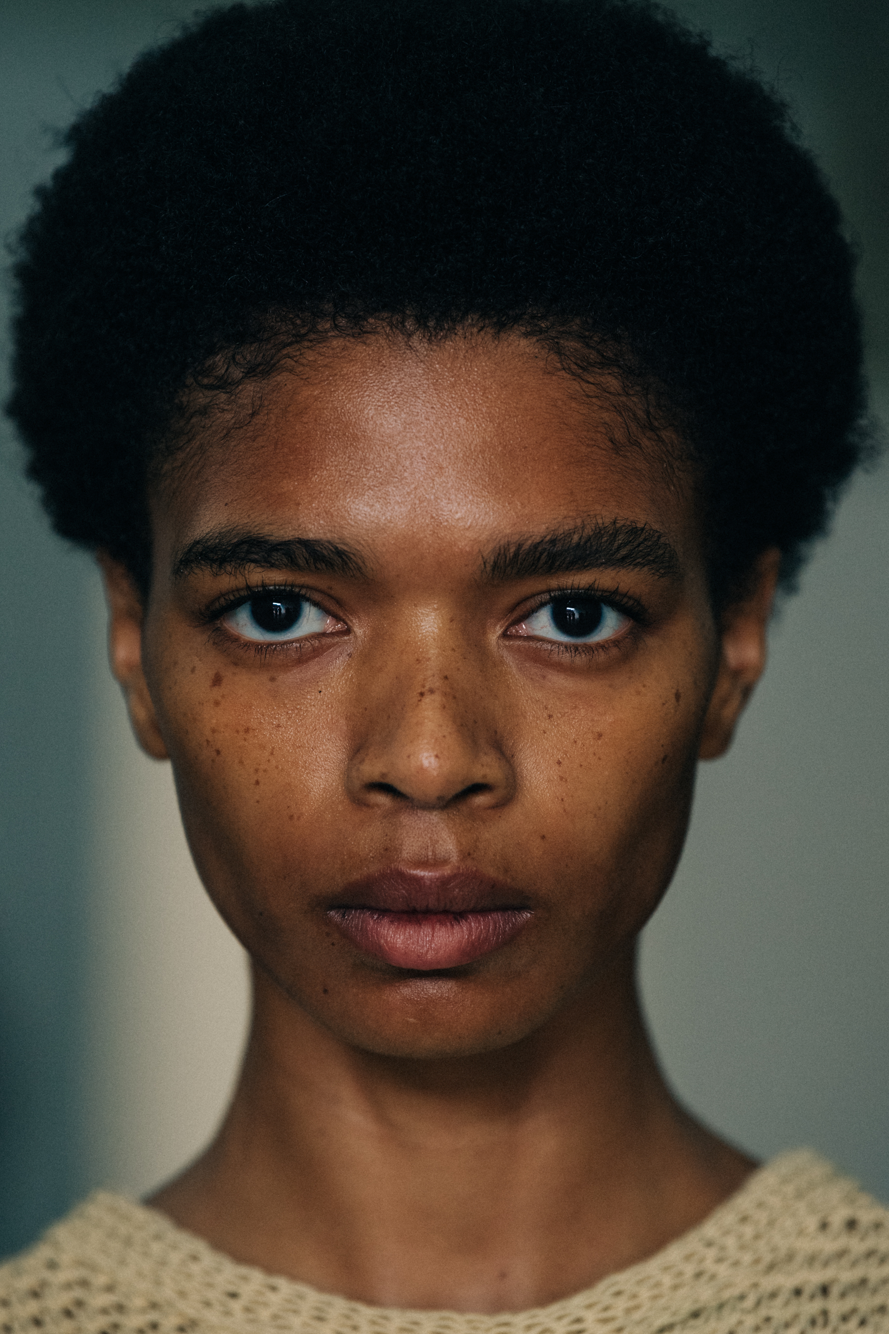 Portrait of model with thick black hair