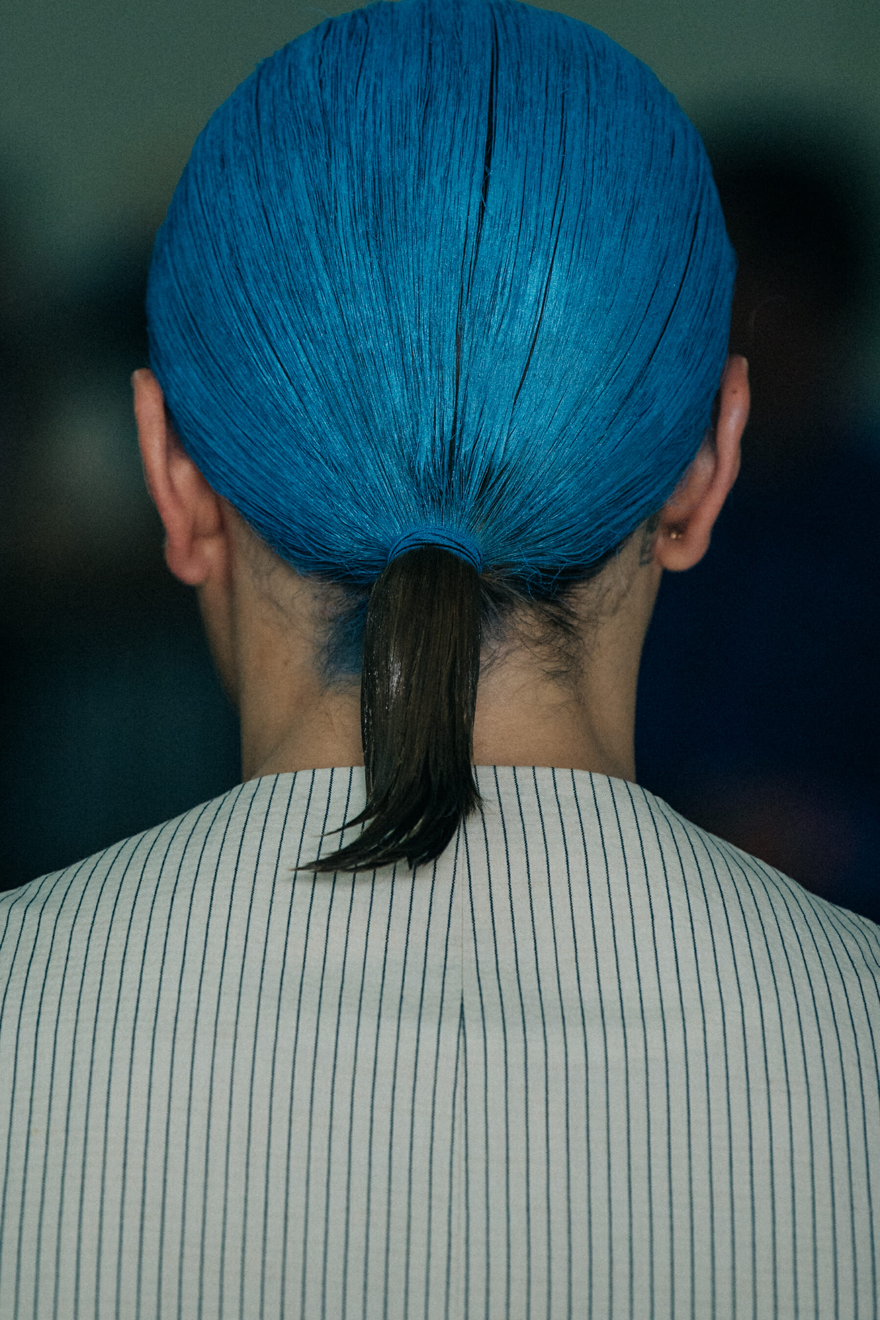 Model with blue hair at Eckhaus Latta