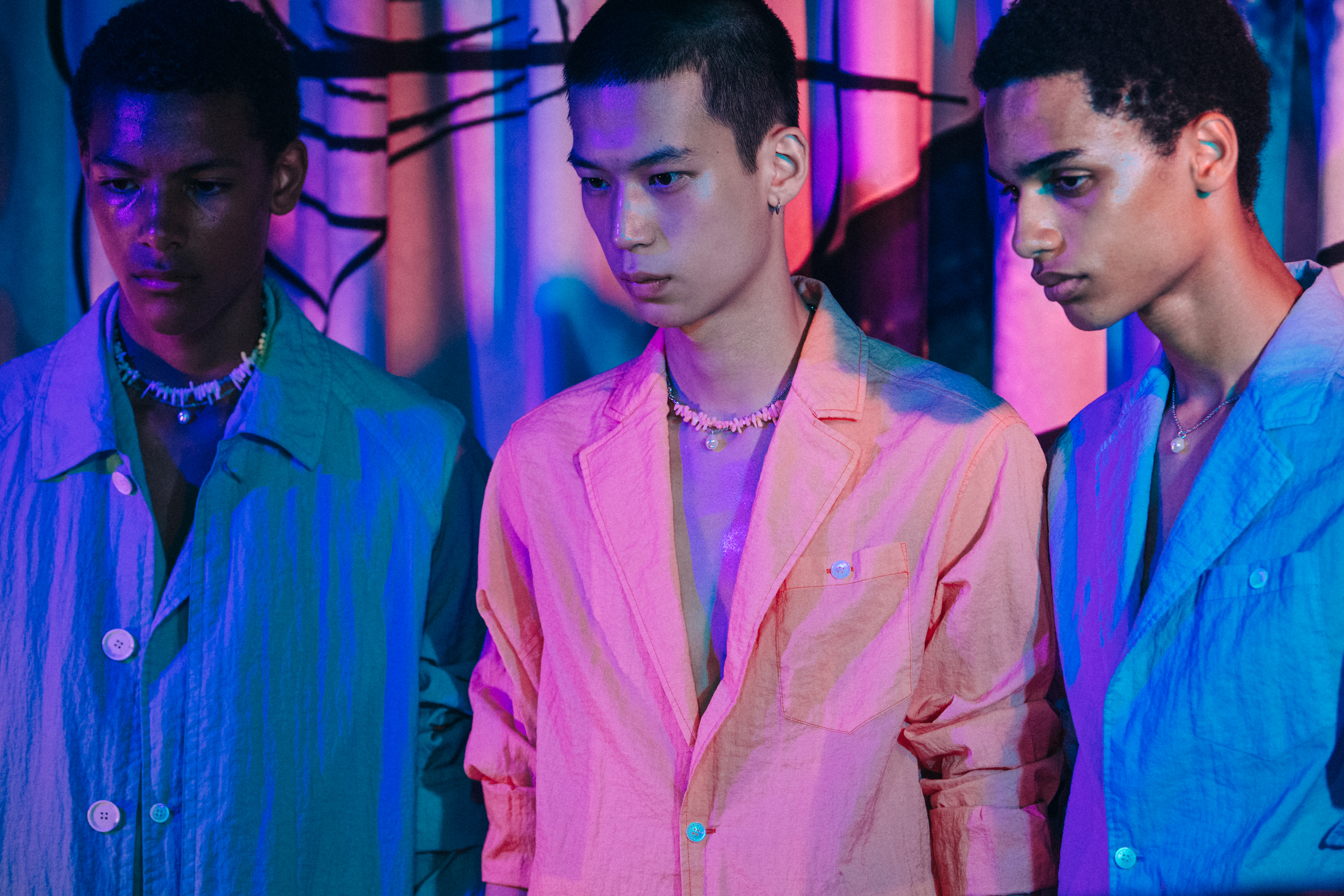 Models wearing colourful outfits at Kenzo