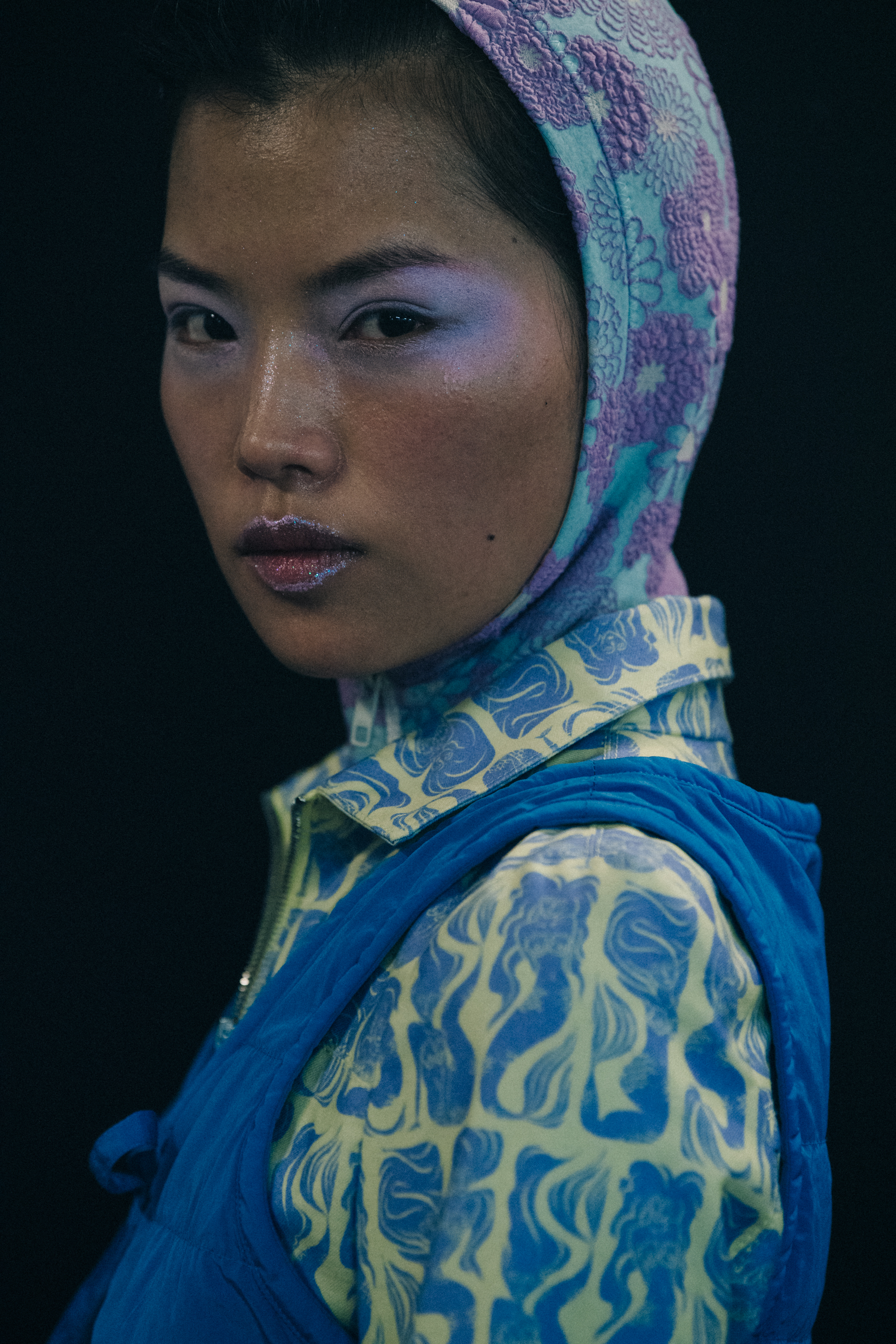 Models wearing colourful outfits at Kenzo