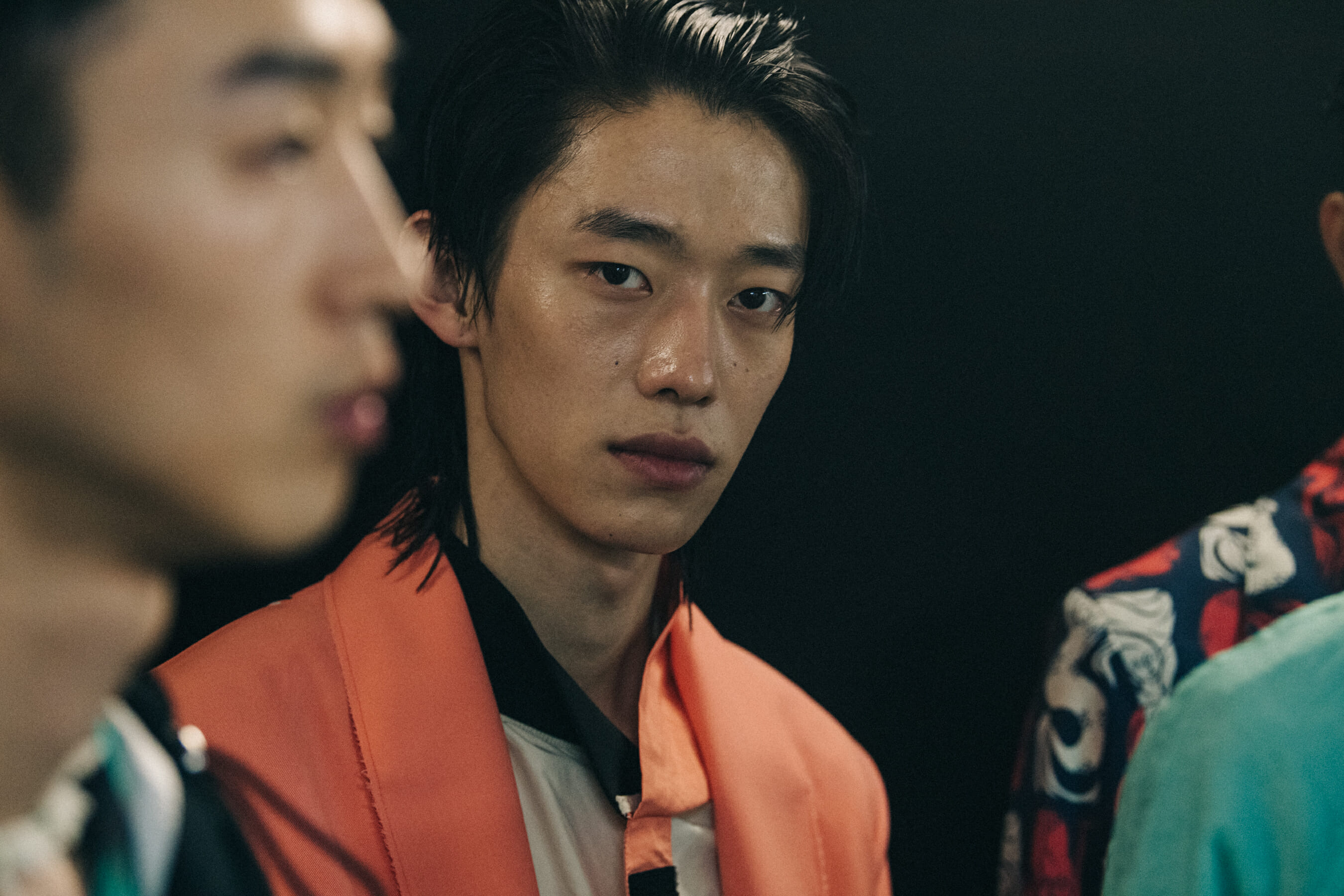 Models wearing colourful outfits at Kenzo