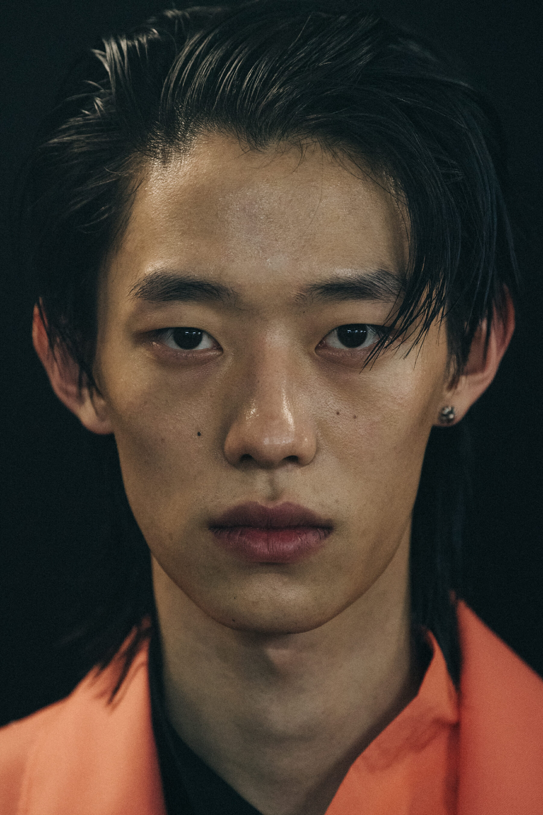 Models wearing colourful outfits at Kenzo