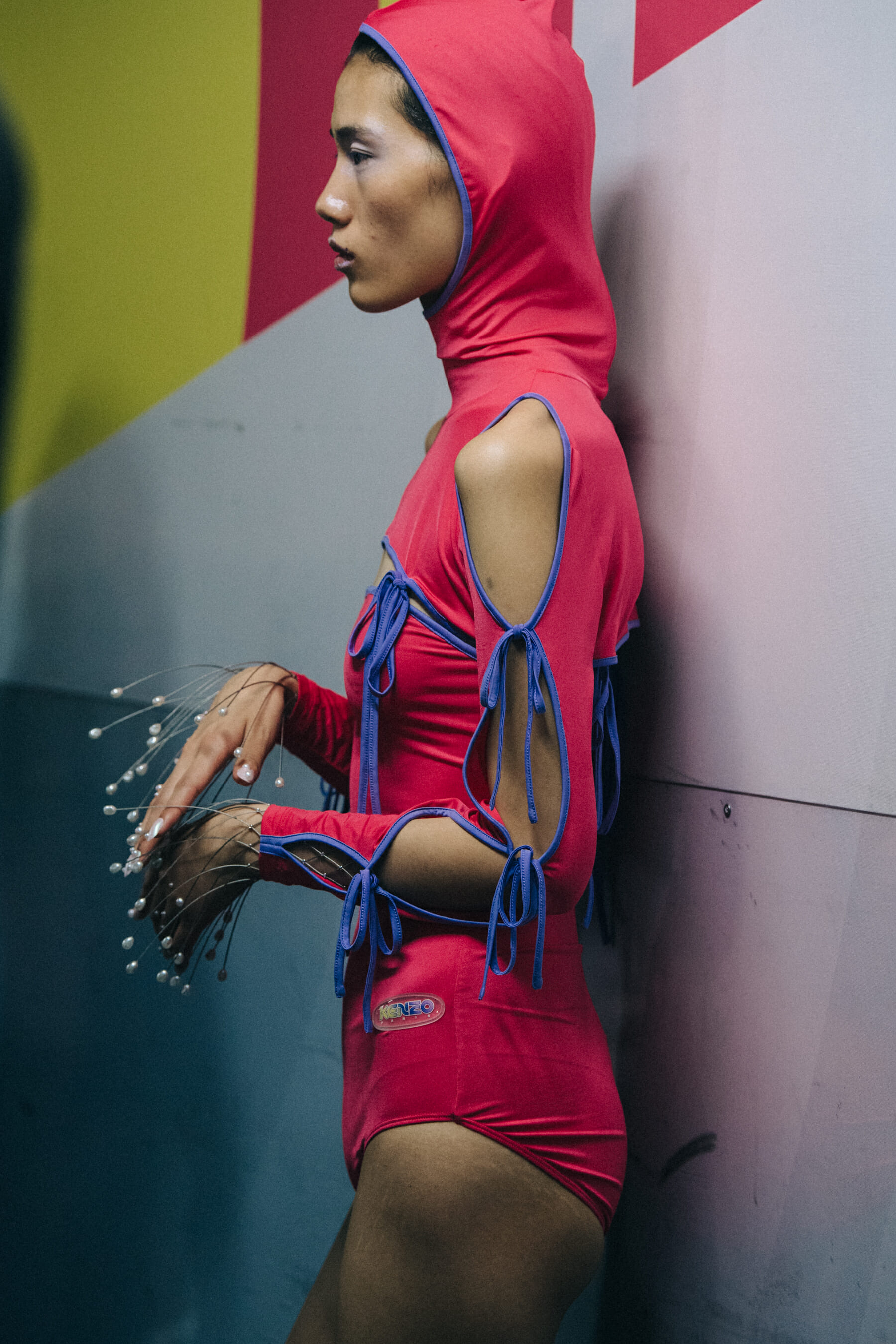 Models wearing colourful outfits at Kenzo