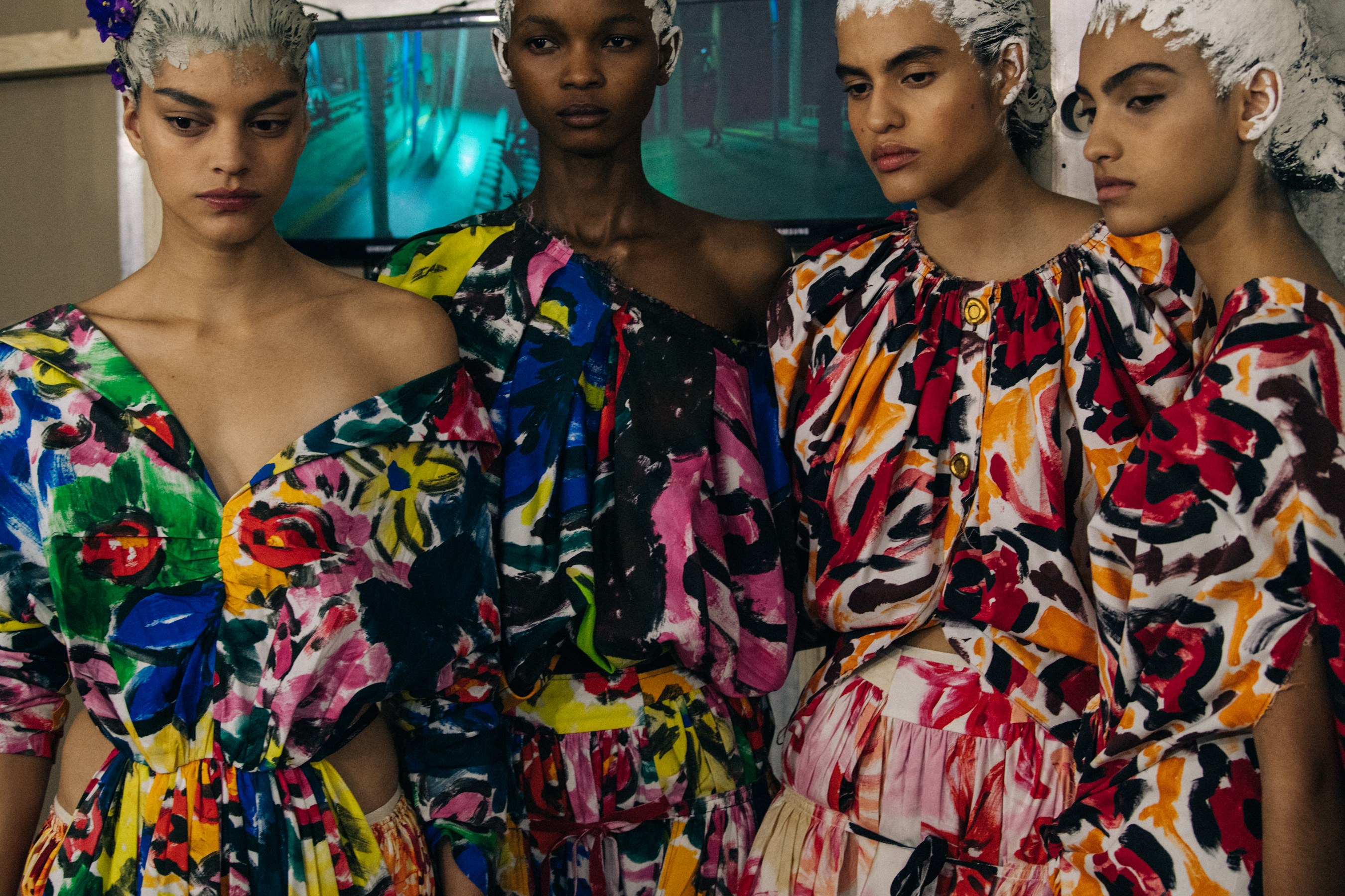 Models wearing colourful dresses at Marni