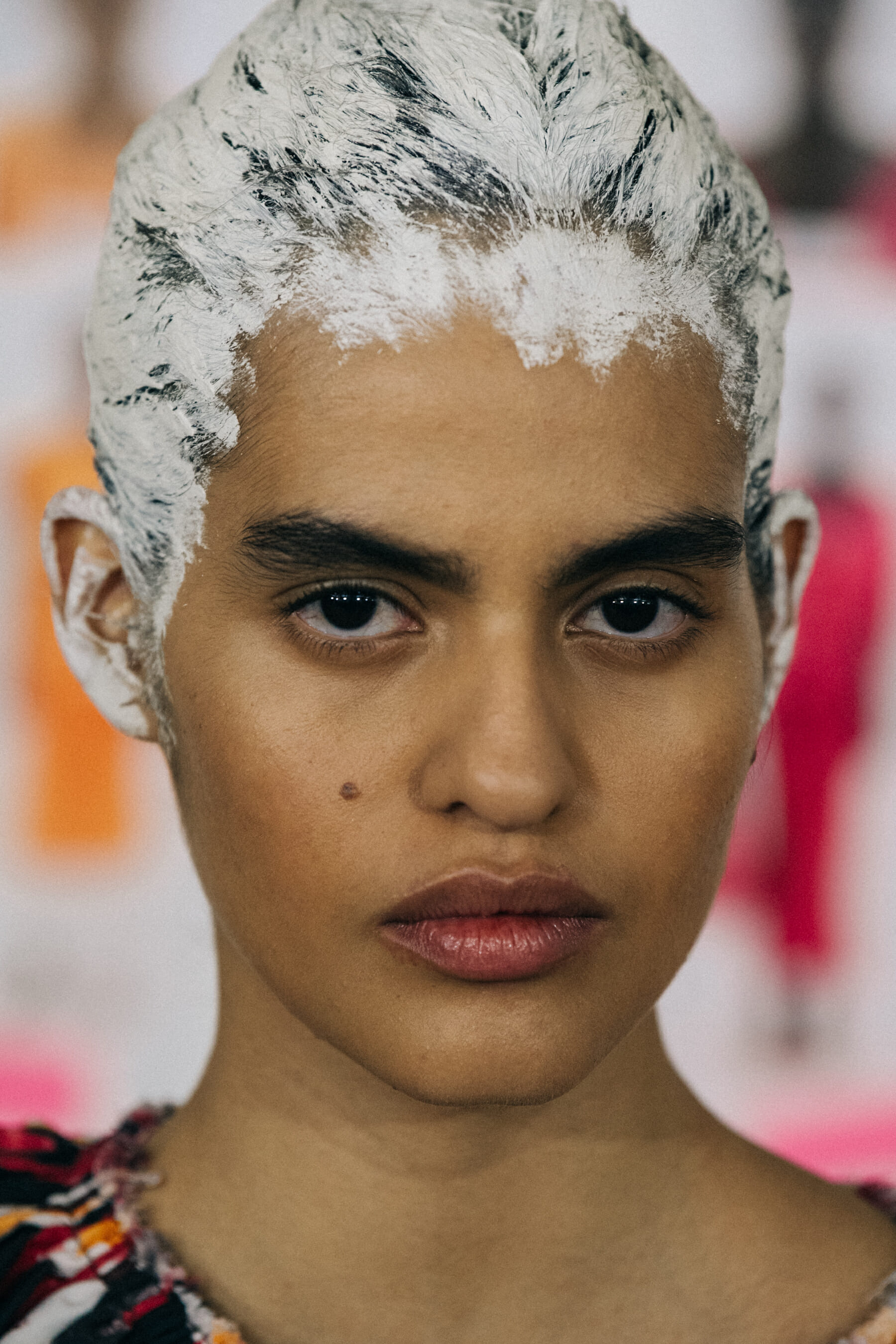 Portrait of model with painted hair
