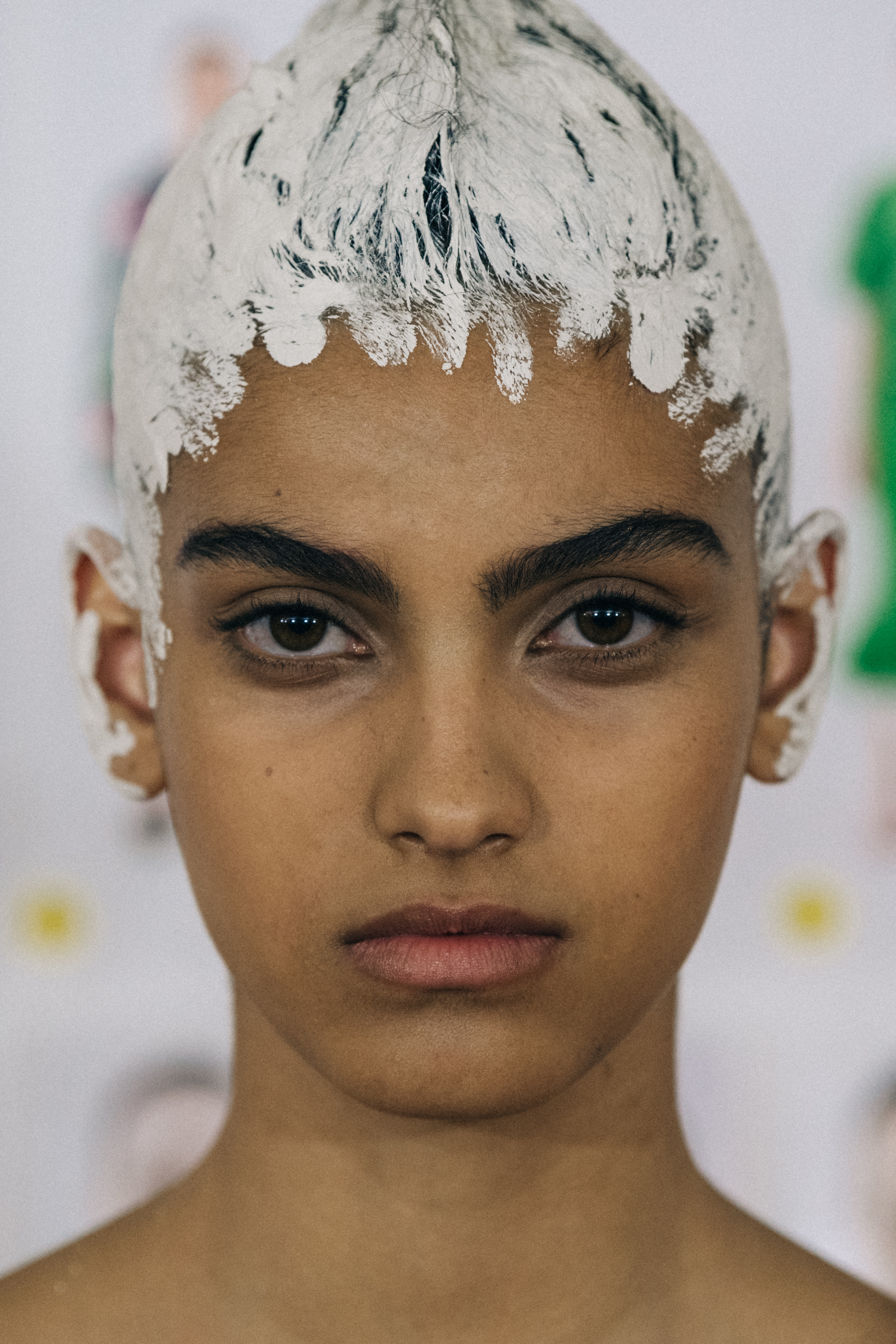 Portrait of model with painted hair