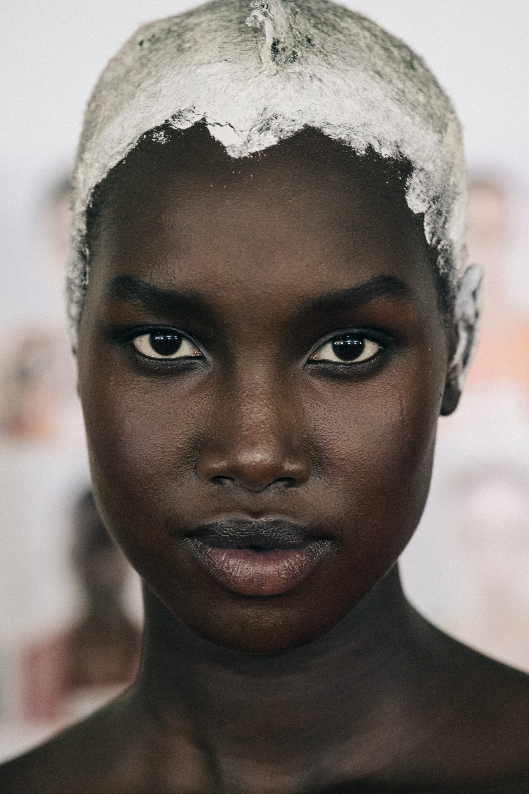 Portrait of model with painted hair