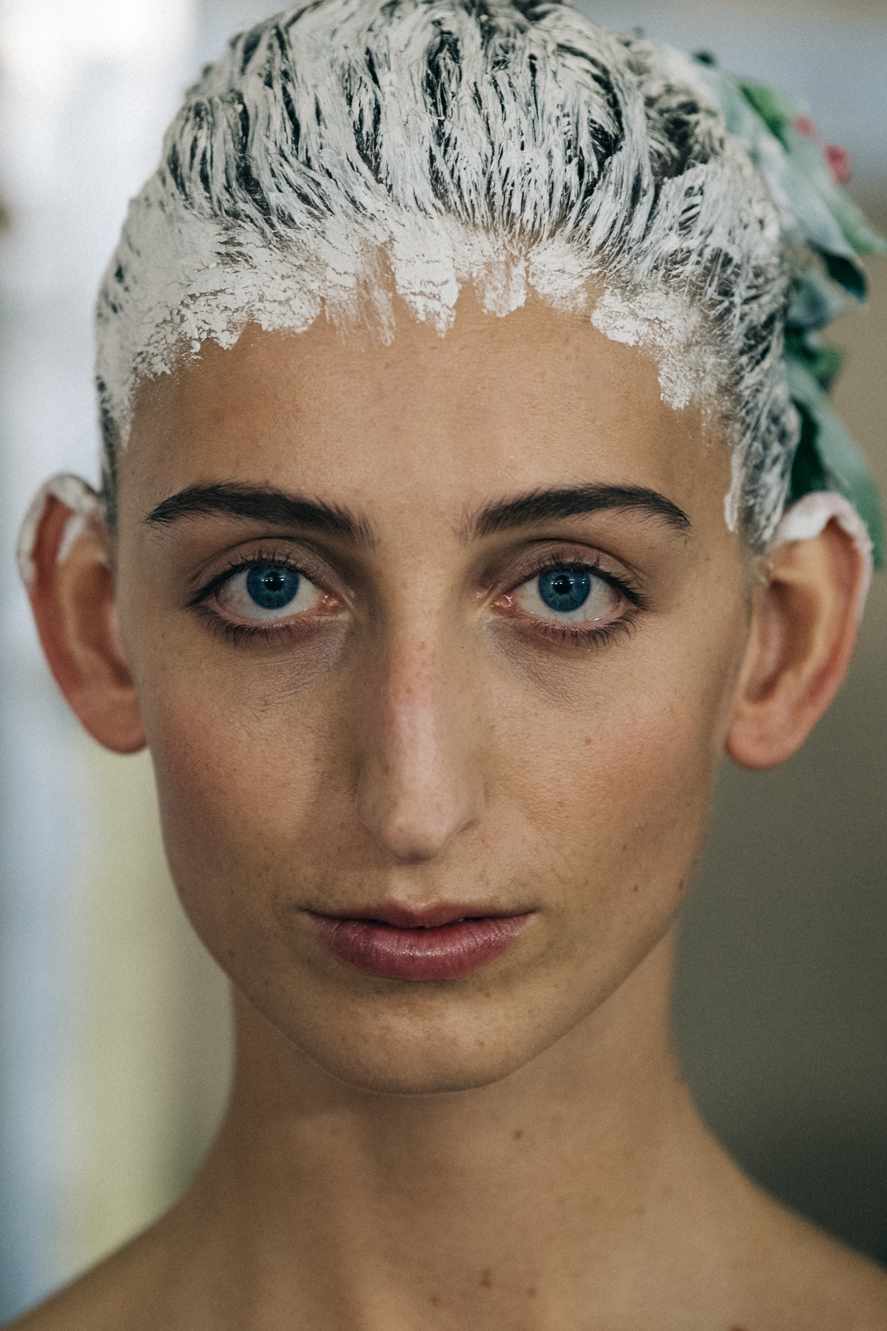 Portrait of model with painted hair