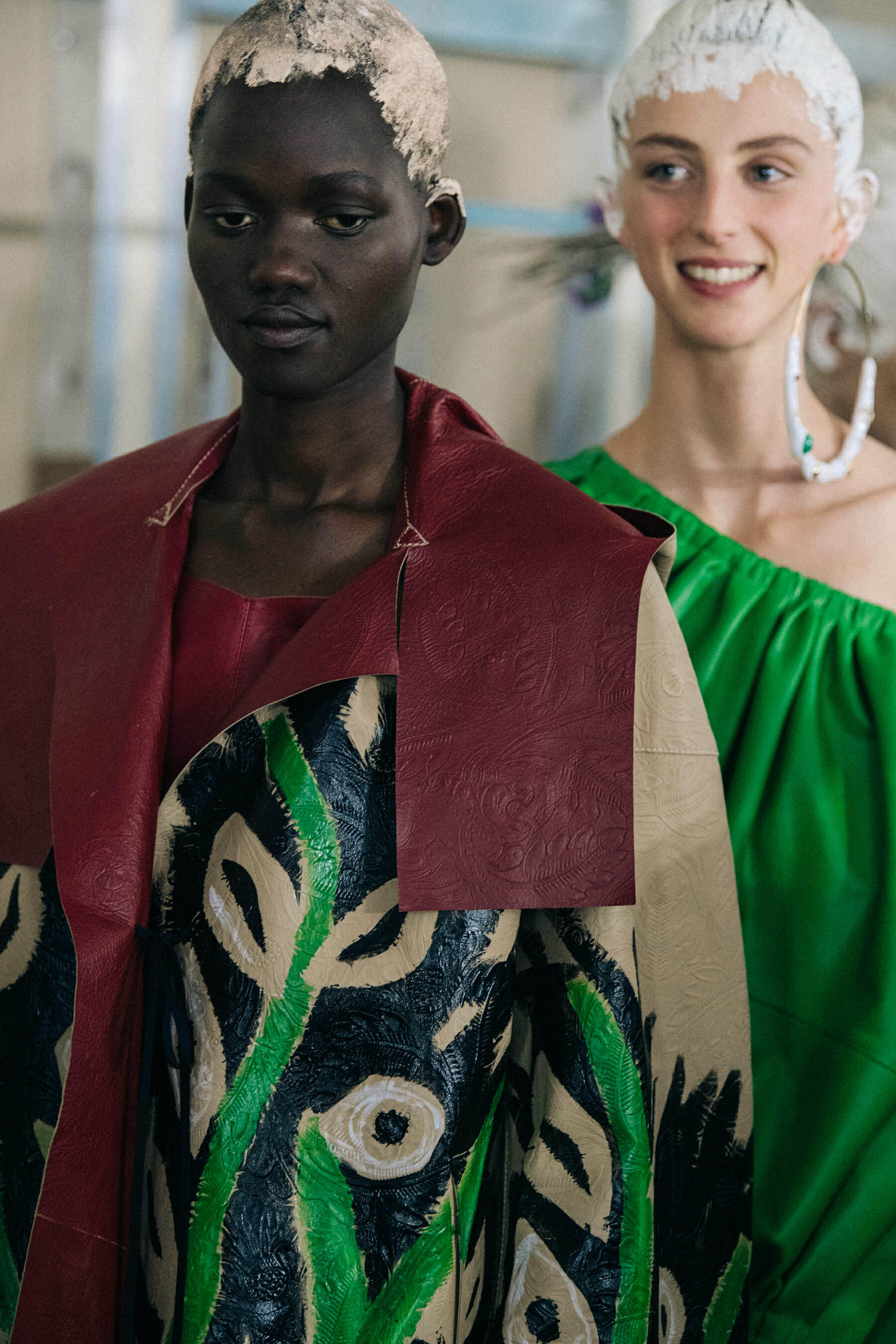 Models wearing colourful dresses at Marni