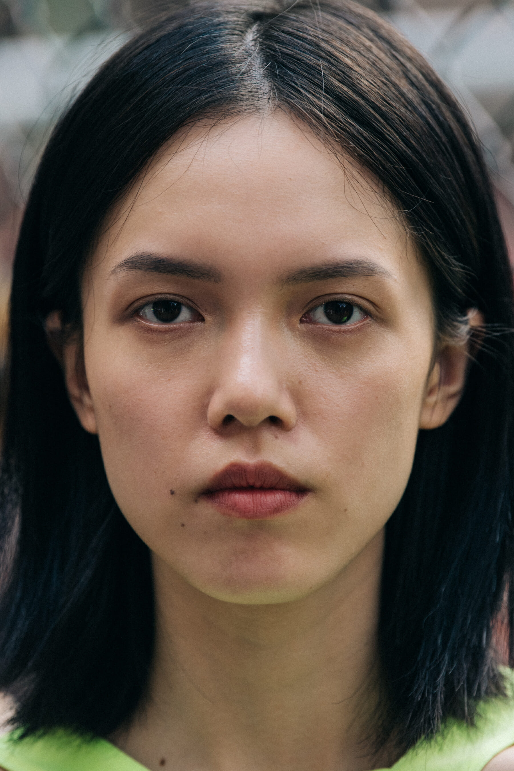 Portrait of model with thick brown hair