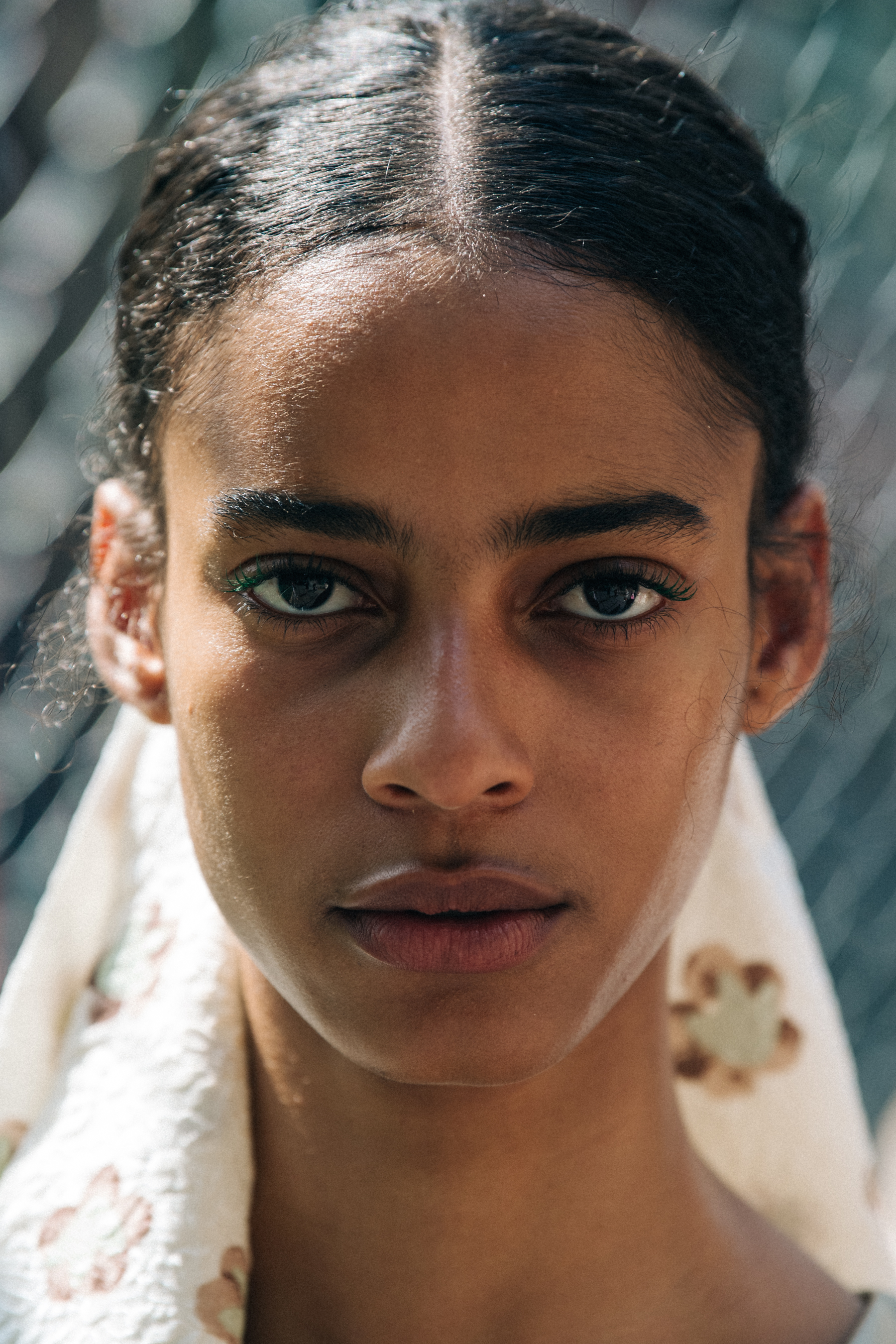Portrait of model with thick brown hair