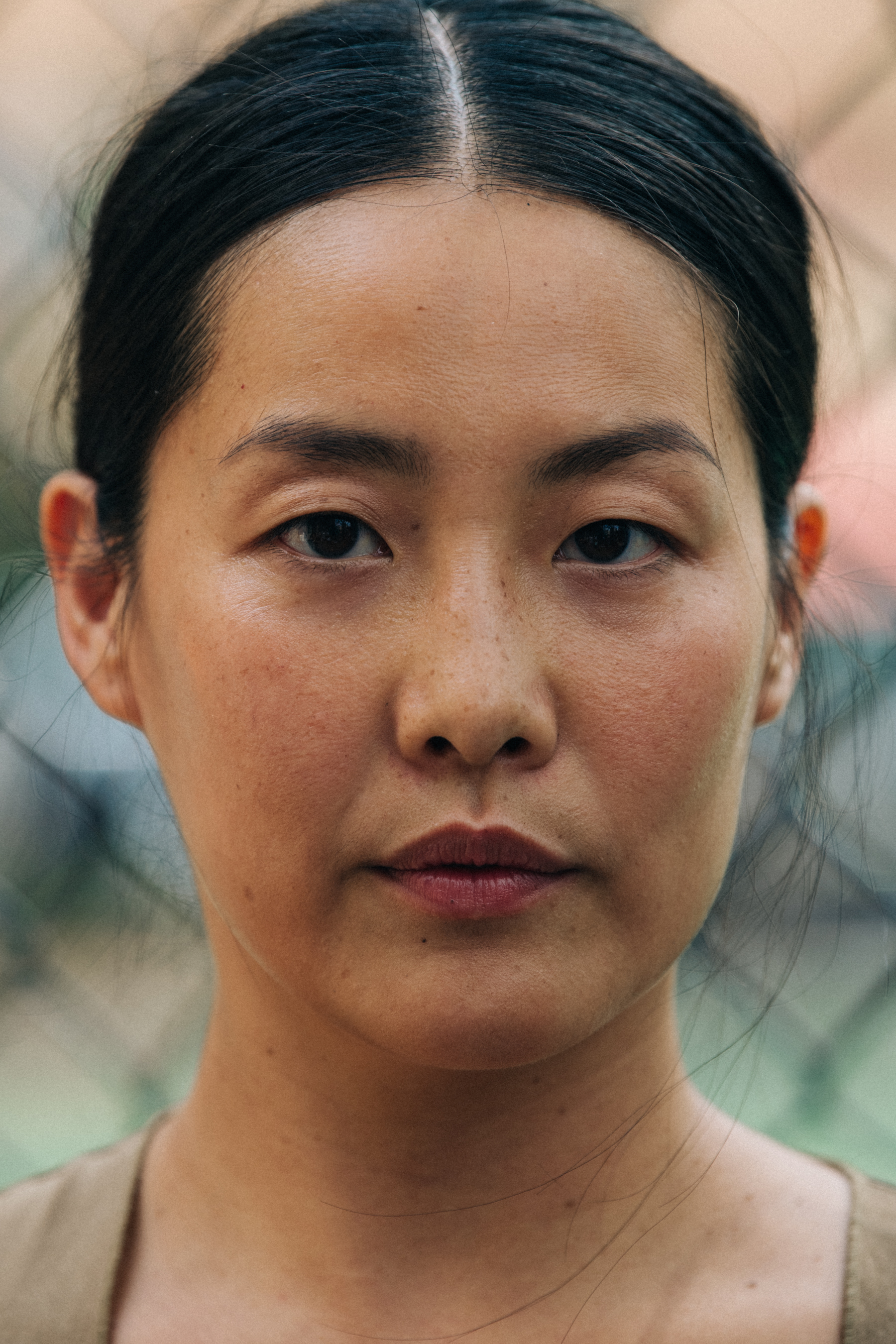 Portrait of model with thick brown hair