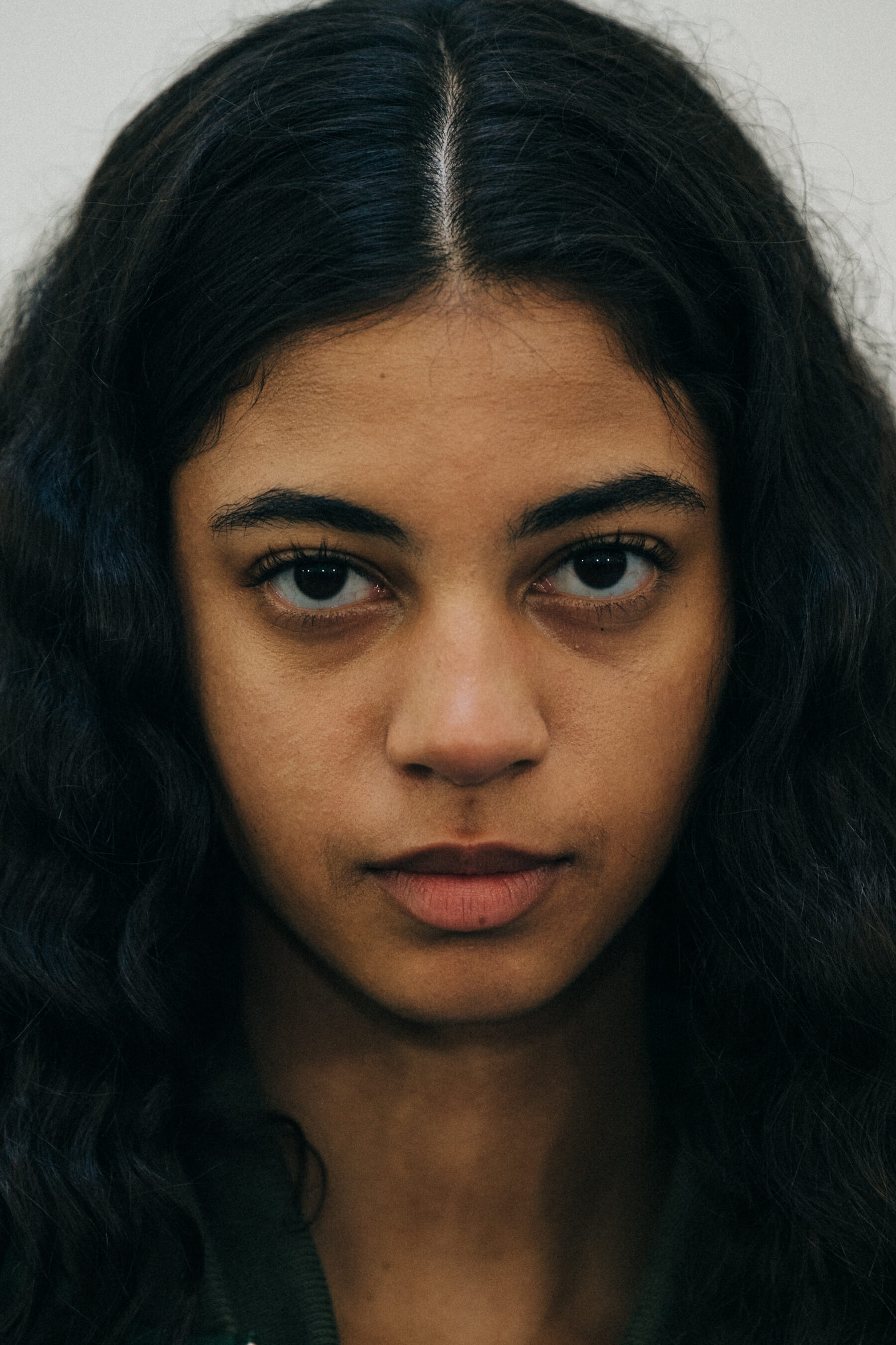 Portrait of model with long dark hair