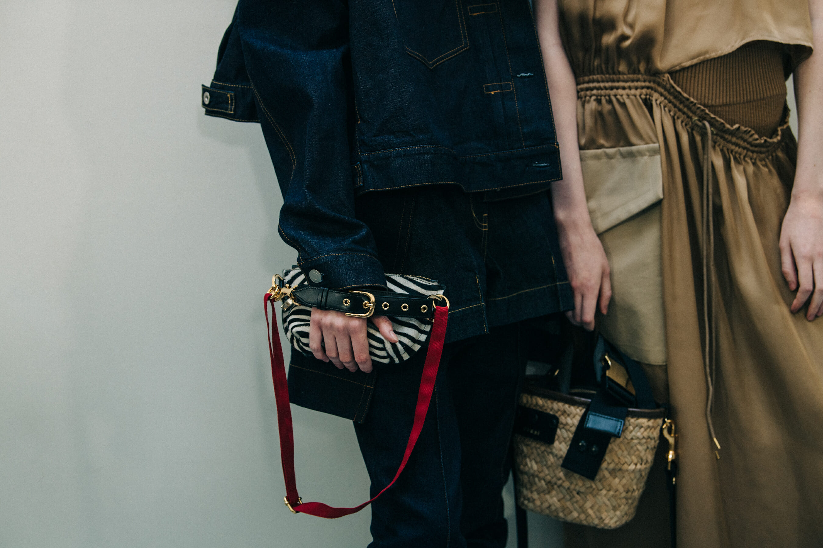 Models wearing Sacai outfits