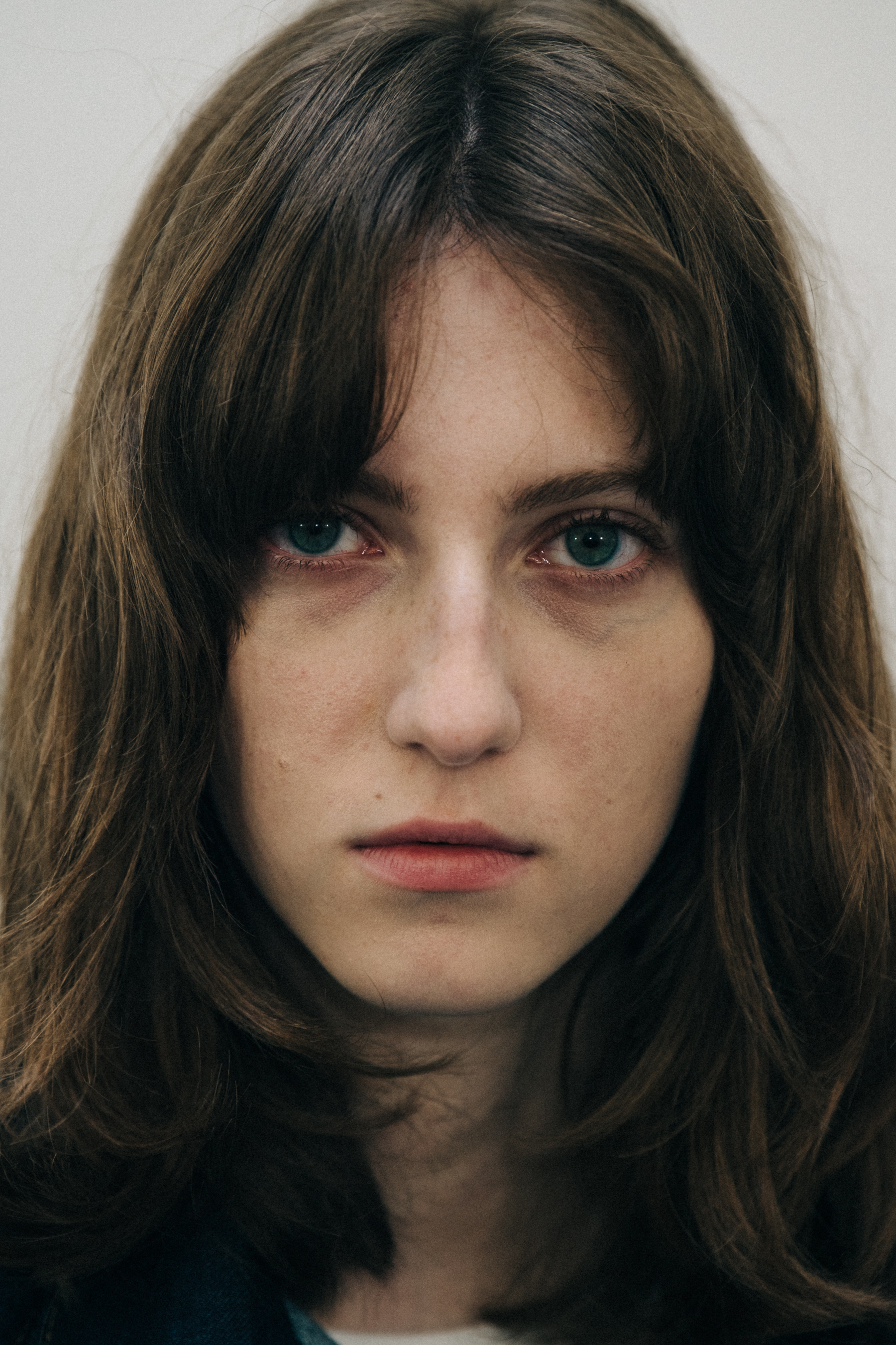 Portrait of model with long dark hair
