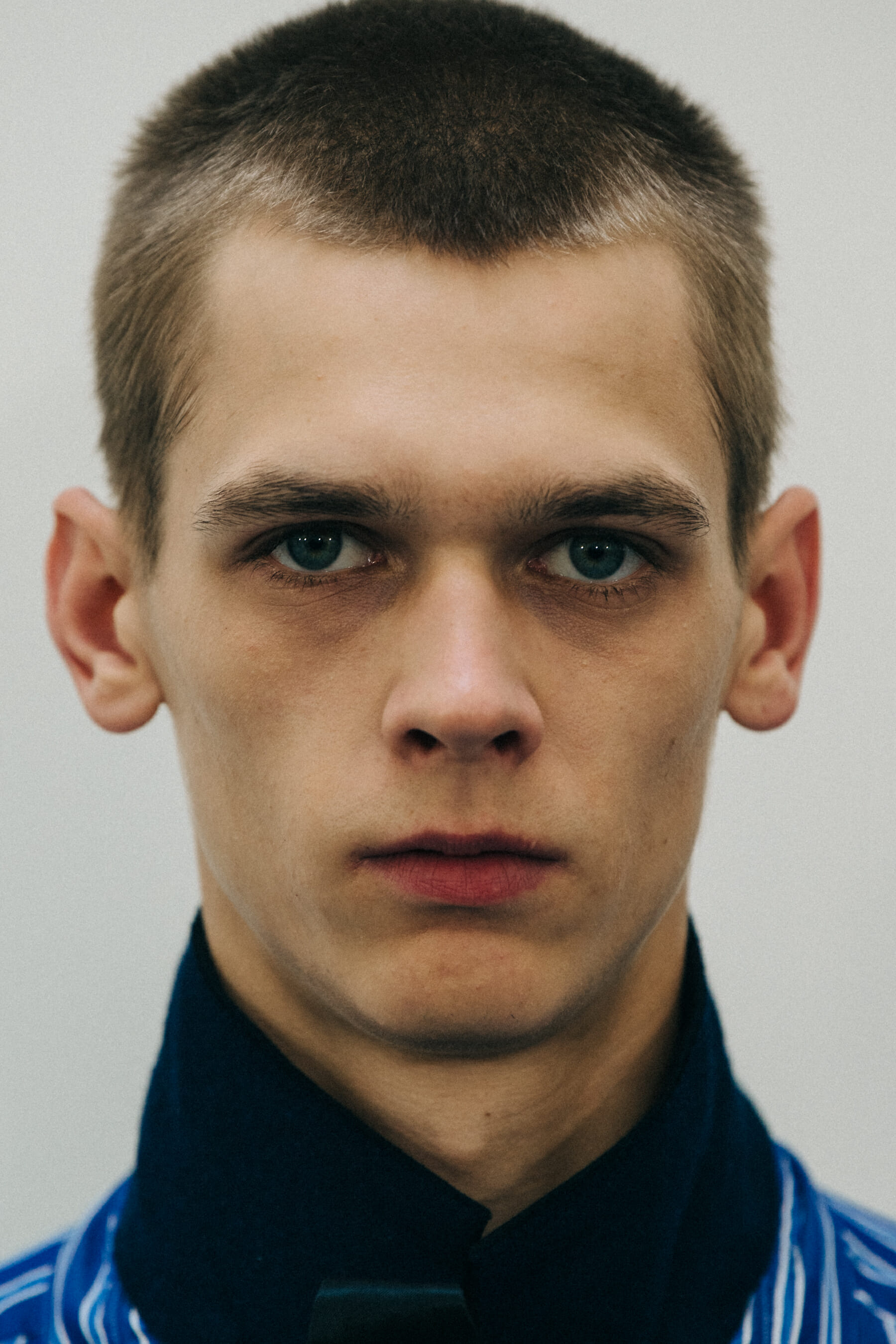 Portrait of model with shaved head
