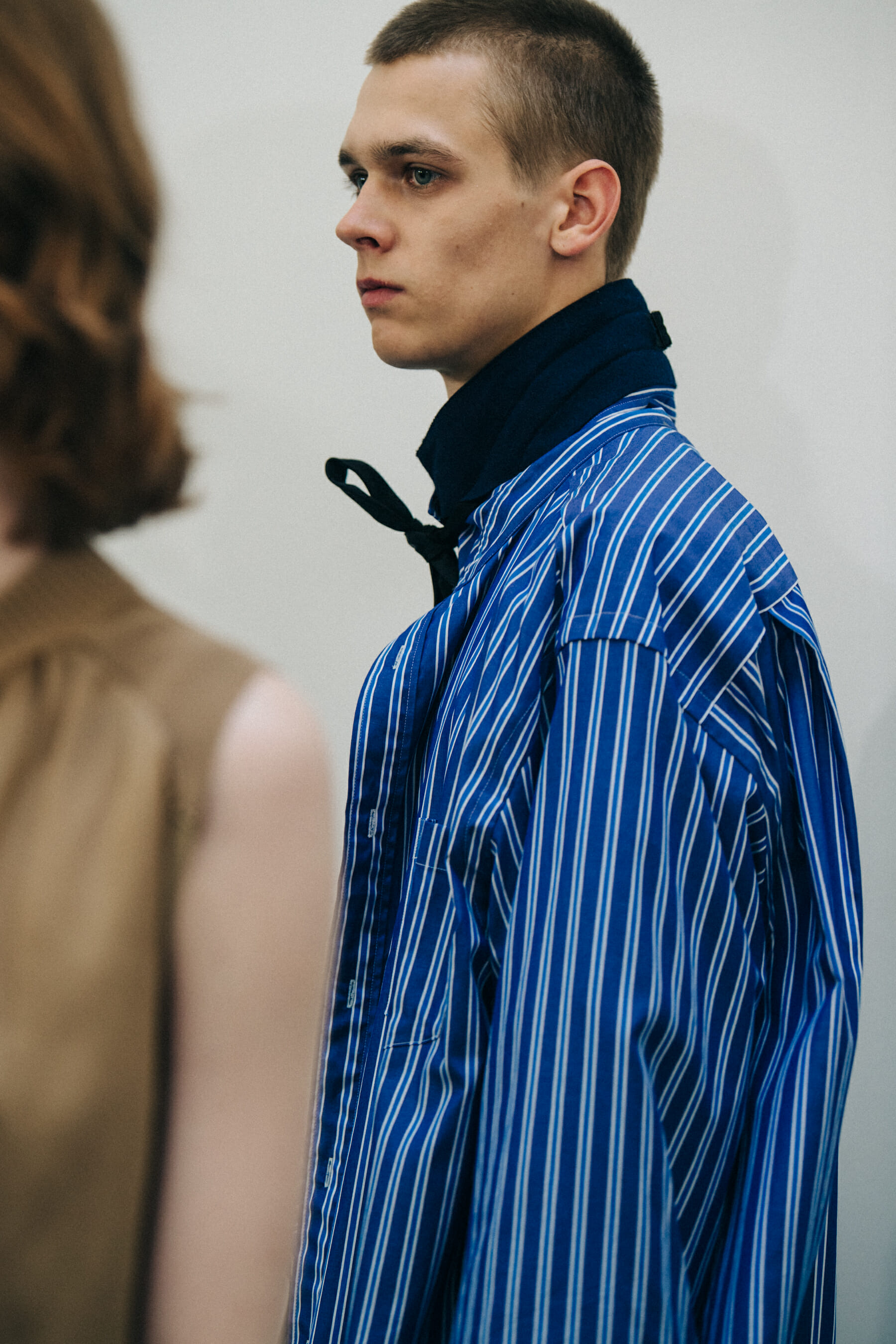 Models wearing Sacai outfits