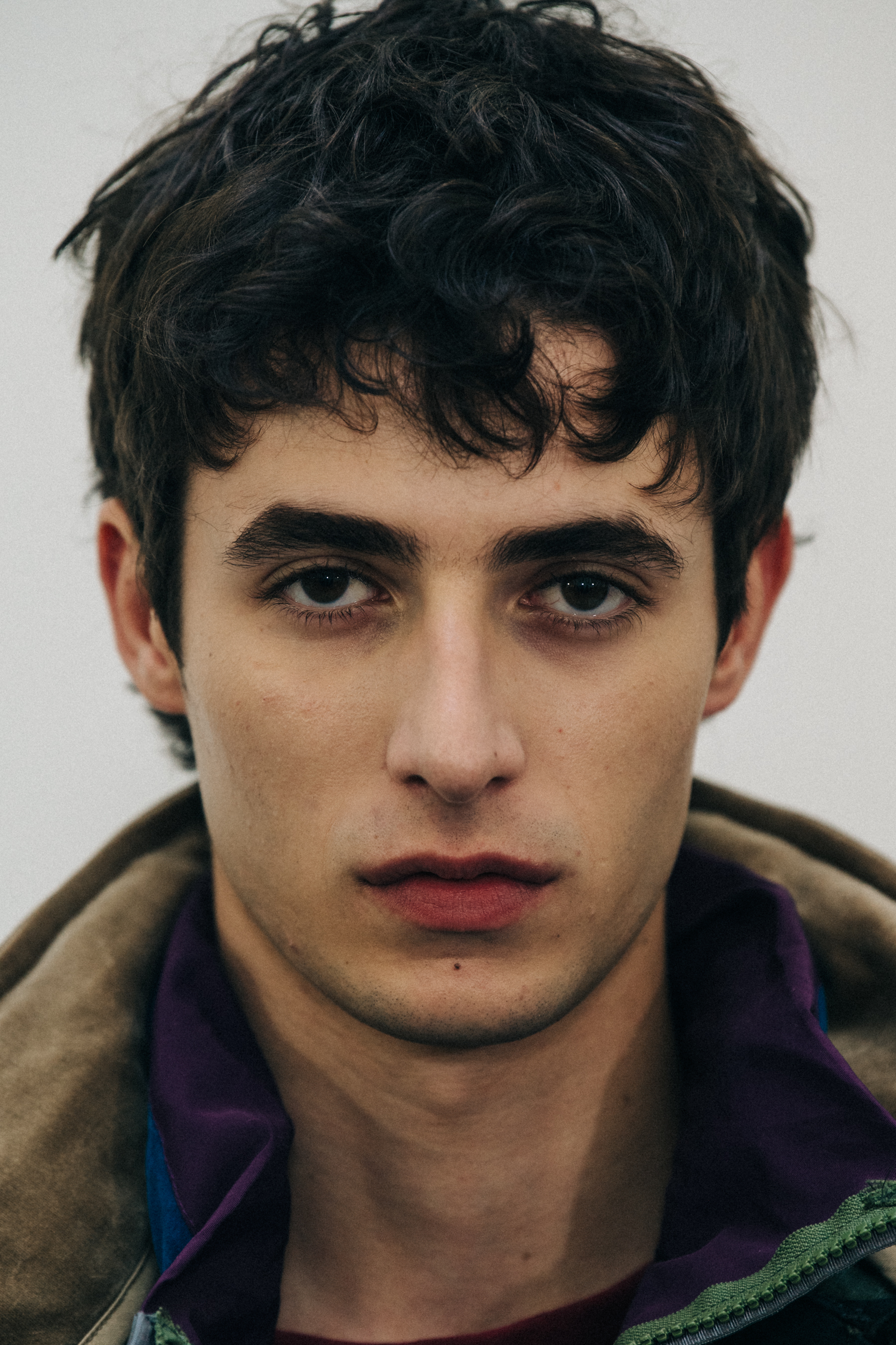 Portrait of model with short brown hair