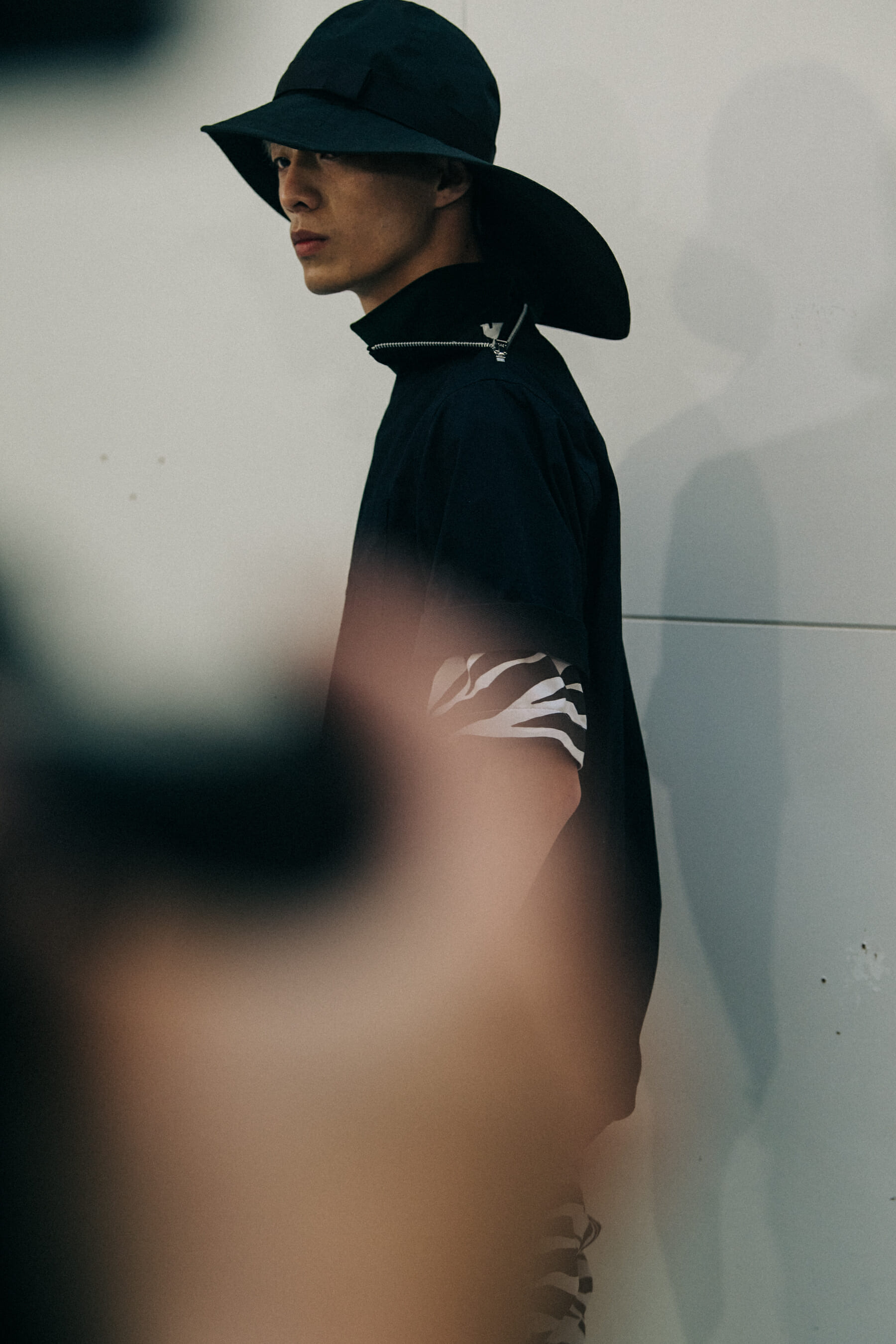 Models wearing Sacai outfits
