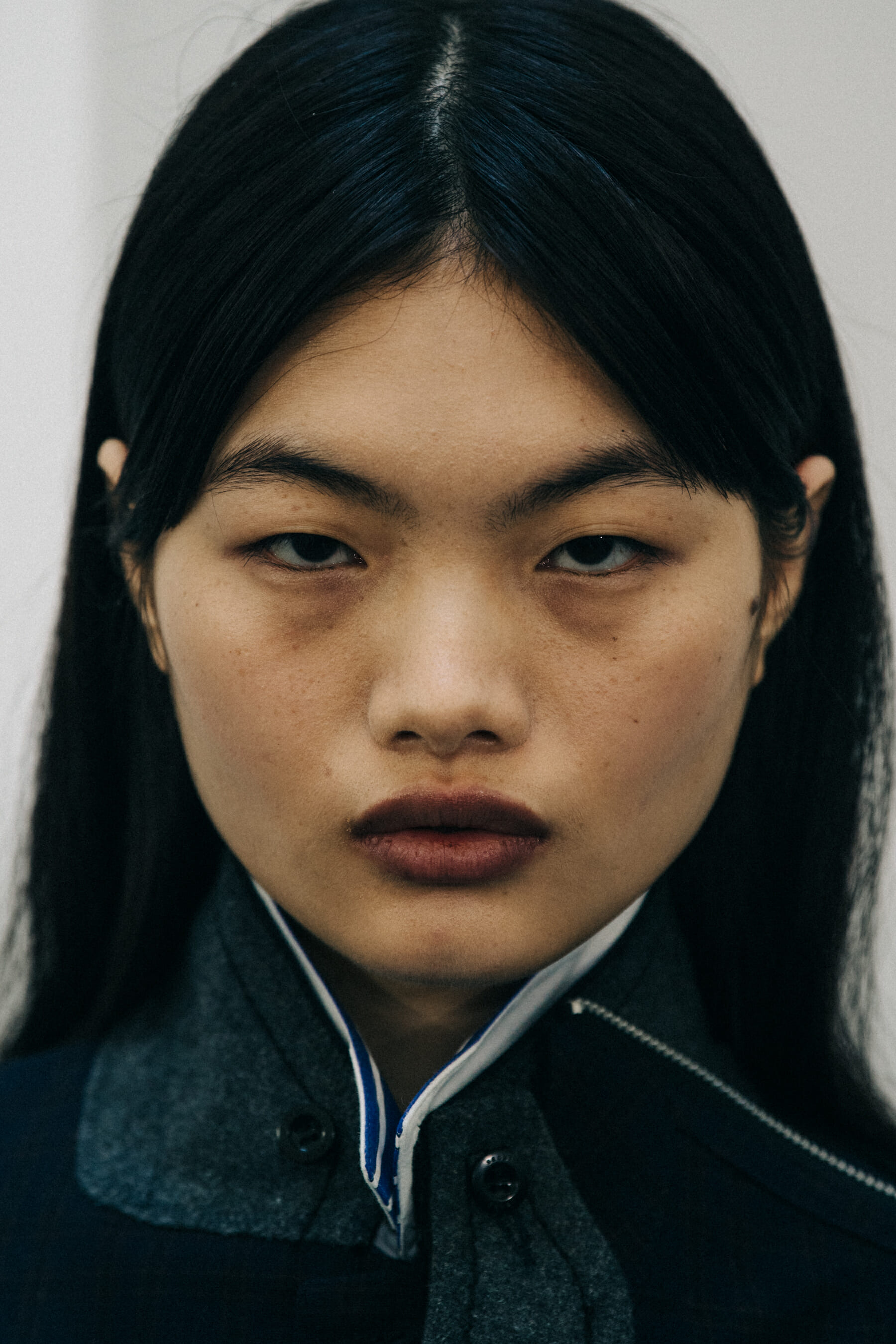 Portrait of model with long dark hair