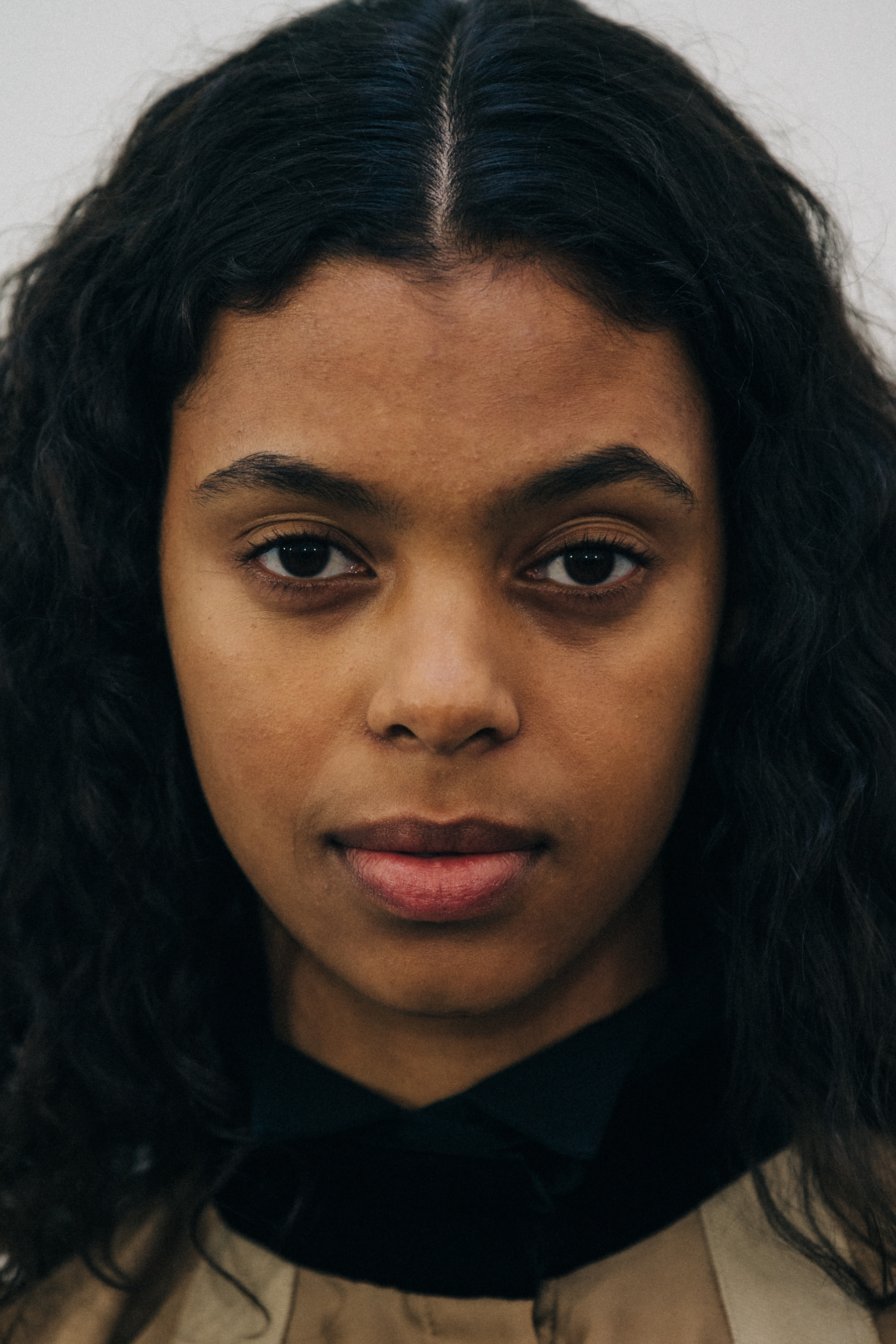 Portrait of model with long dark hair