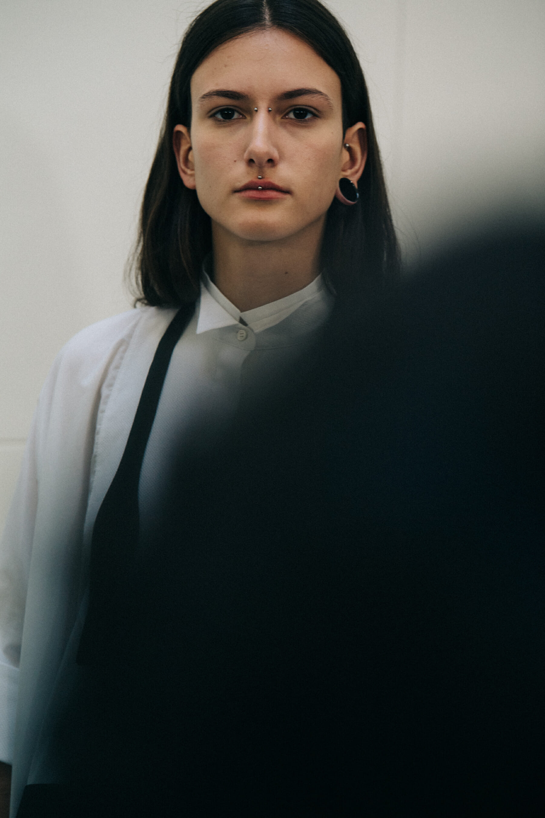 Models wearing Sacai outfits
