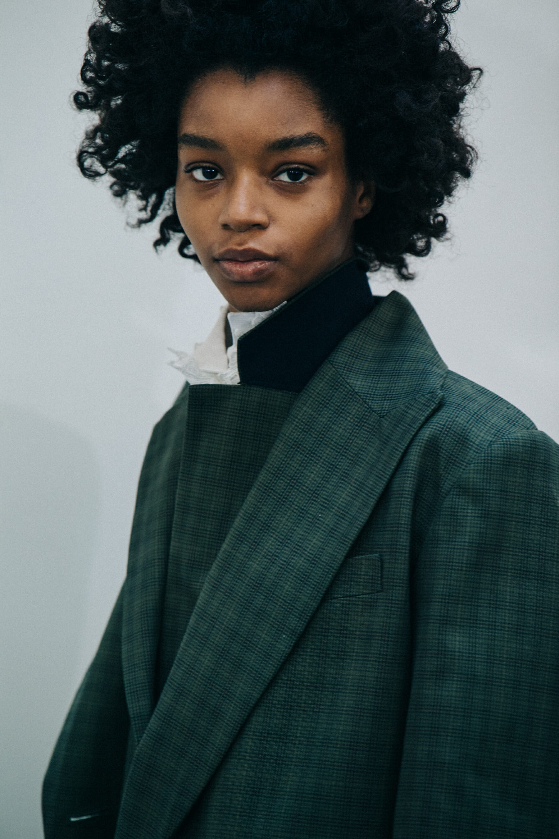 Models wearing Sacai outfits