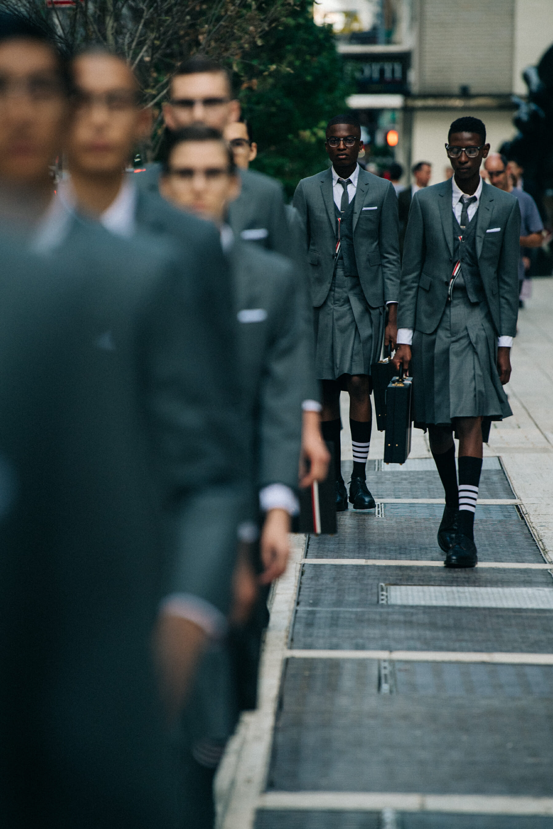 Models wearing Thom Browne suits