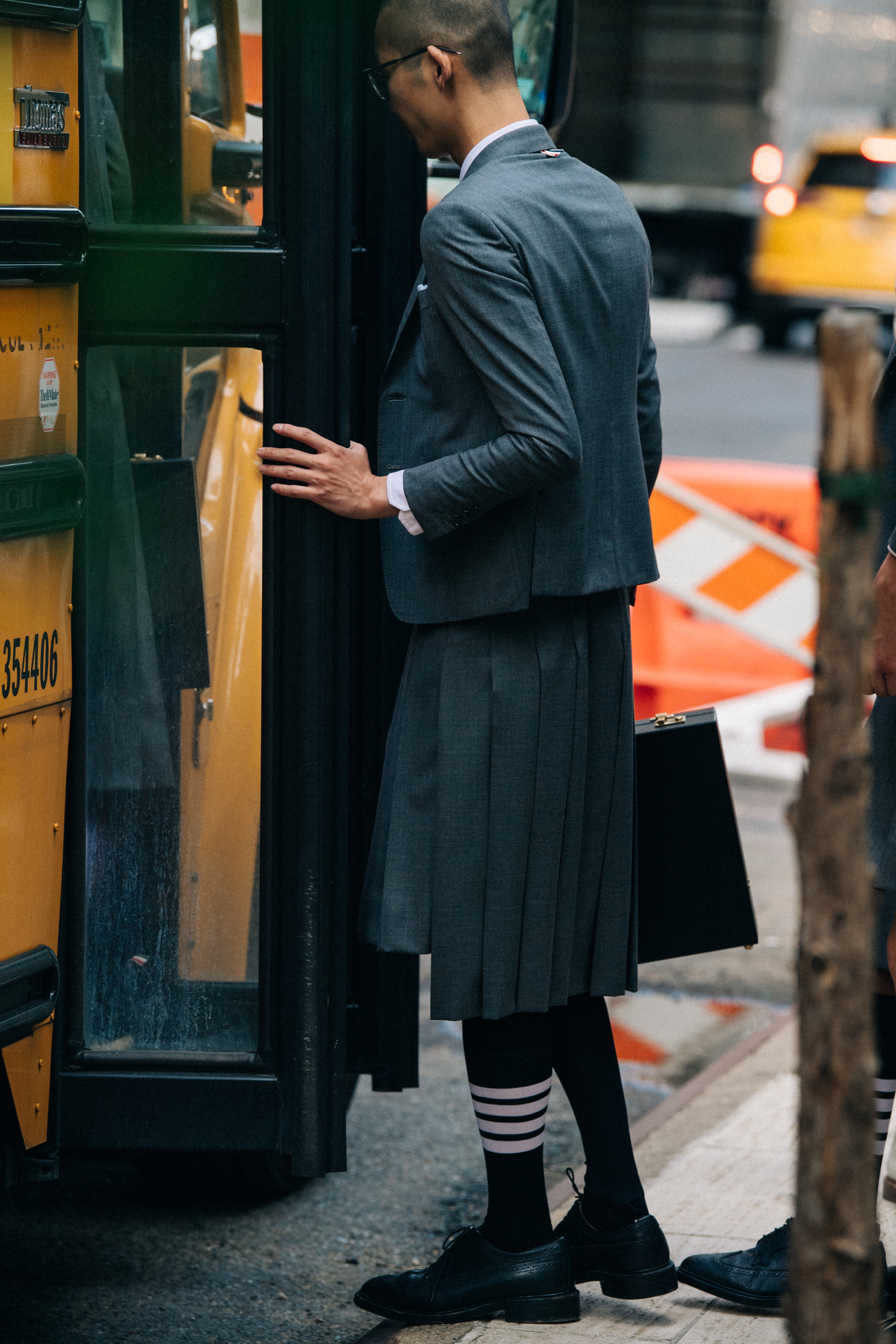 Models wearing Thom Browne suits