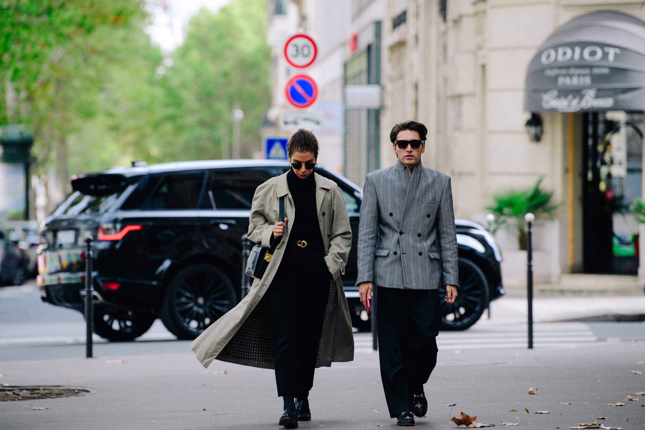 Couple wearing long coats