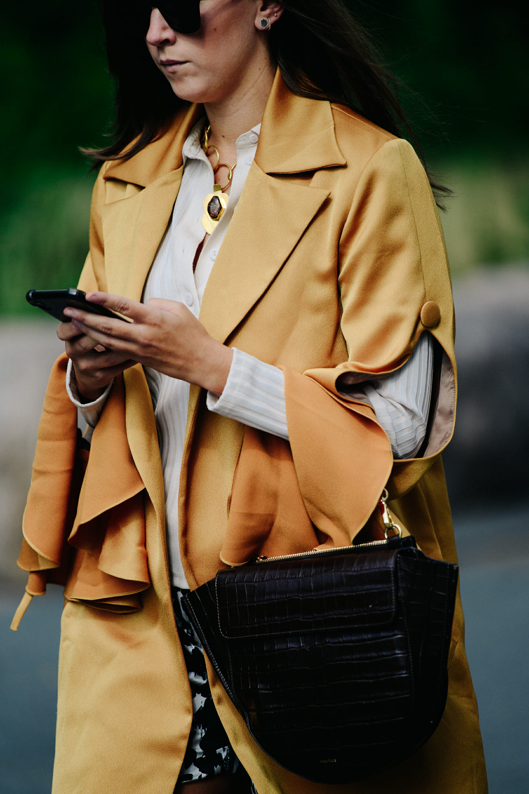 Woman wearing yellow jacket