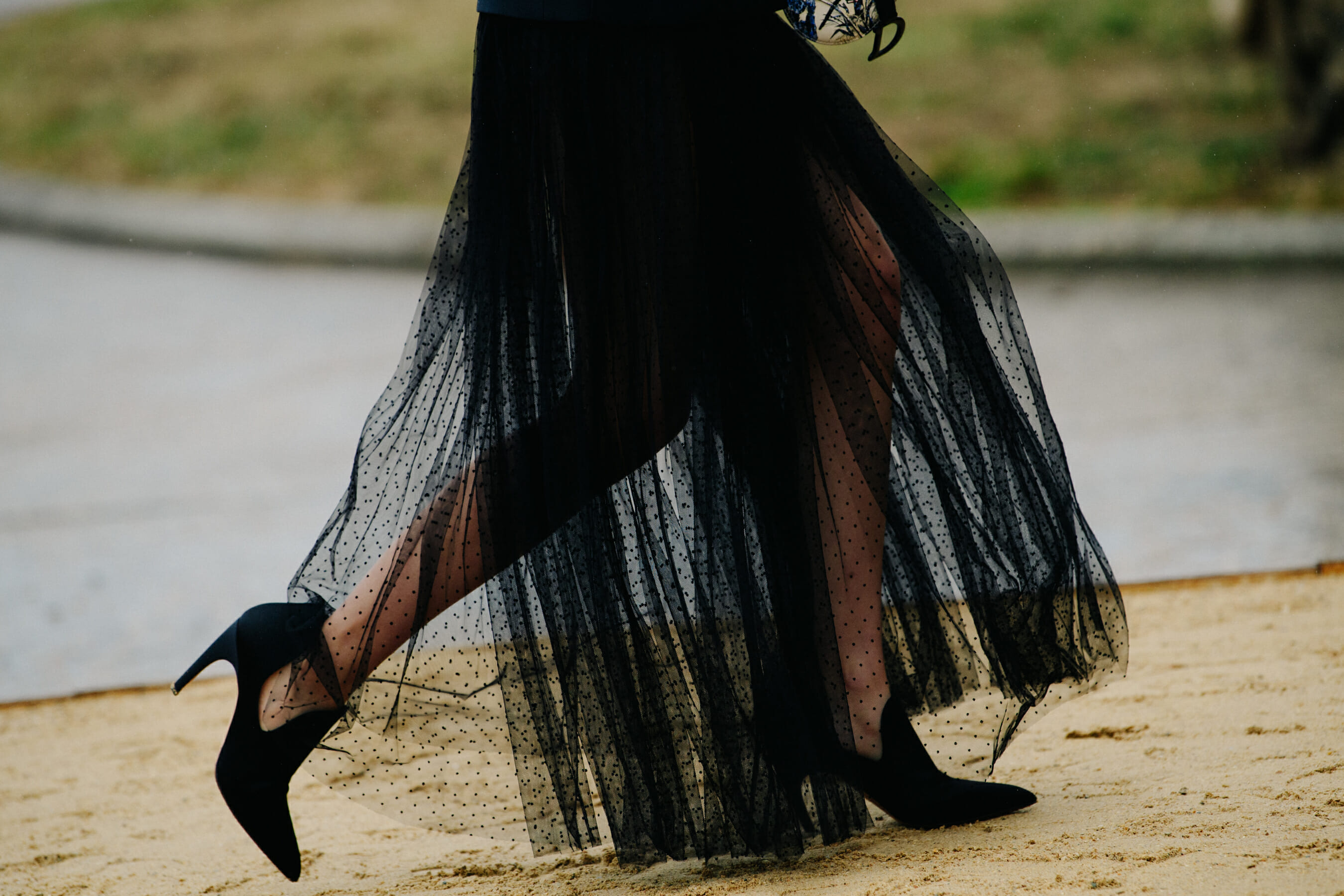 Woman wearing black heels