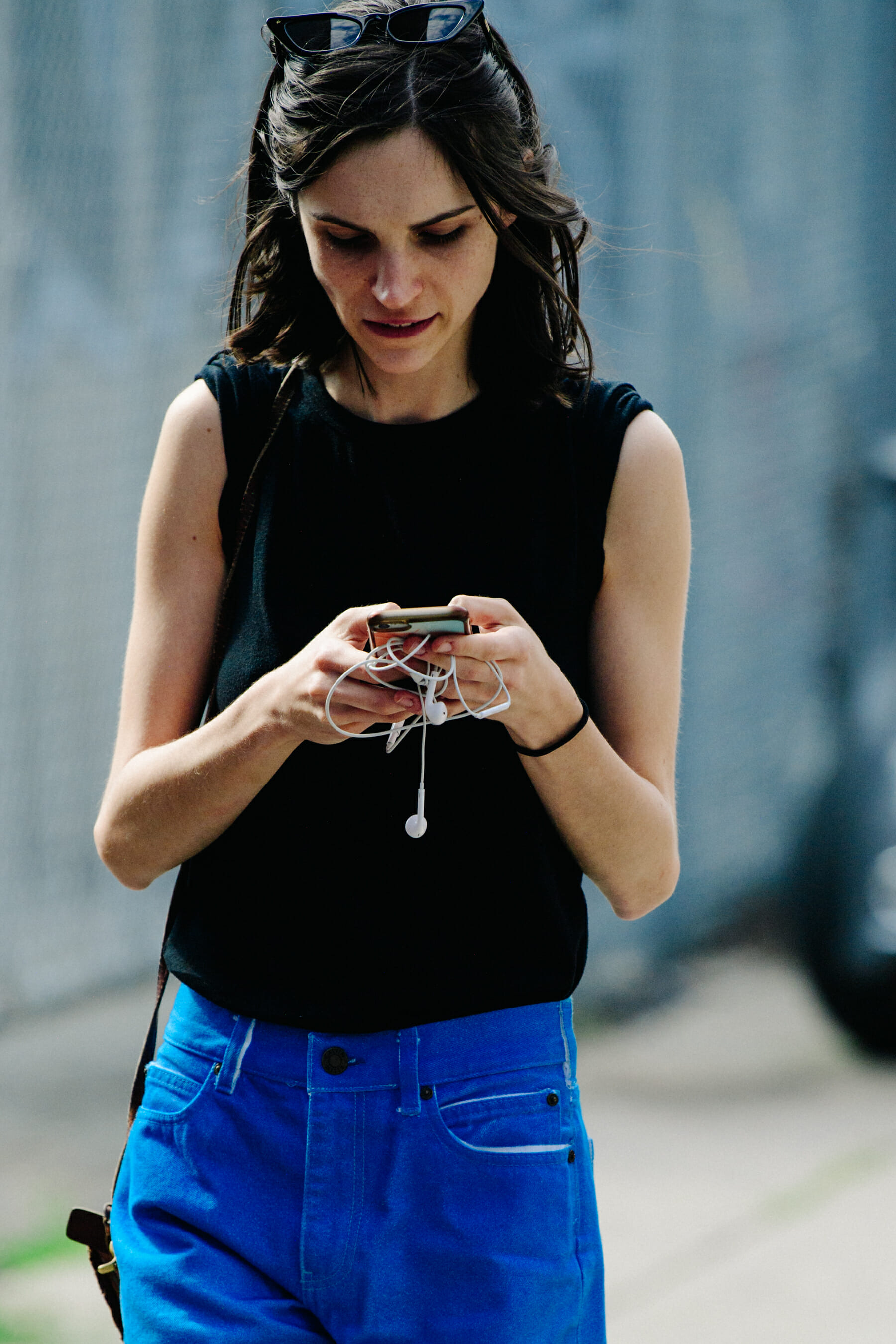 Woman wearing black vest top