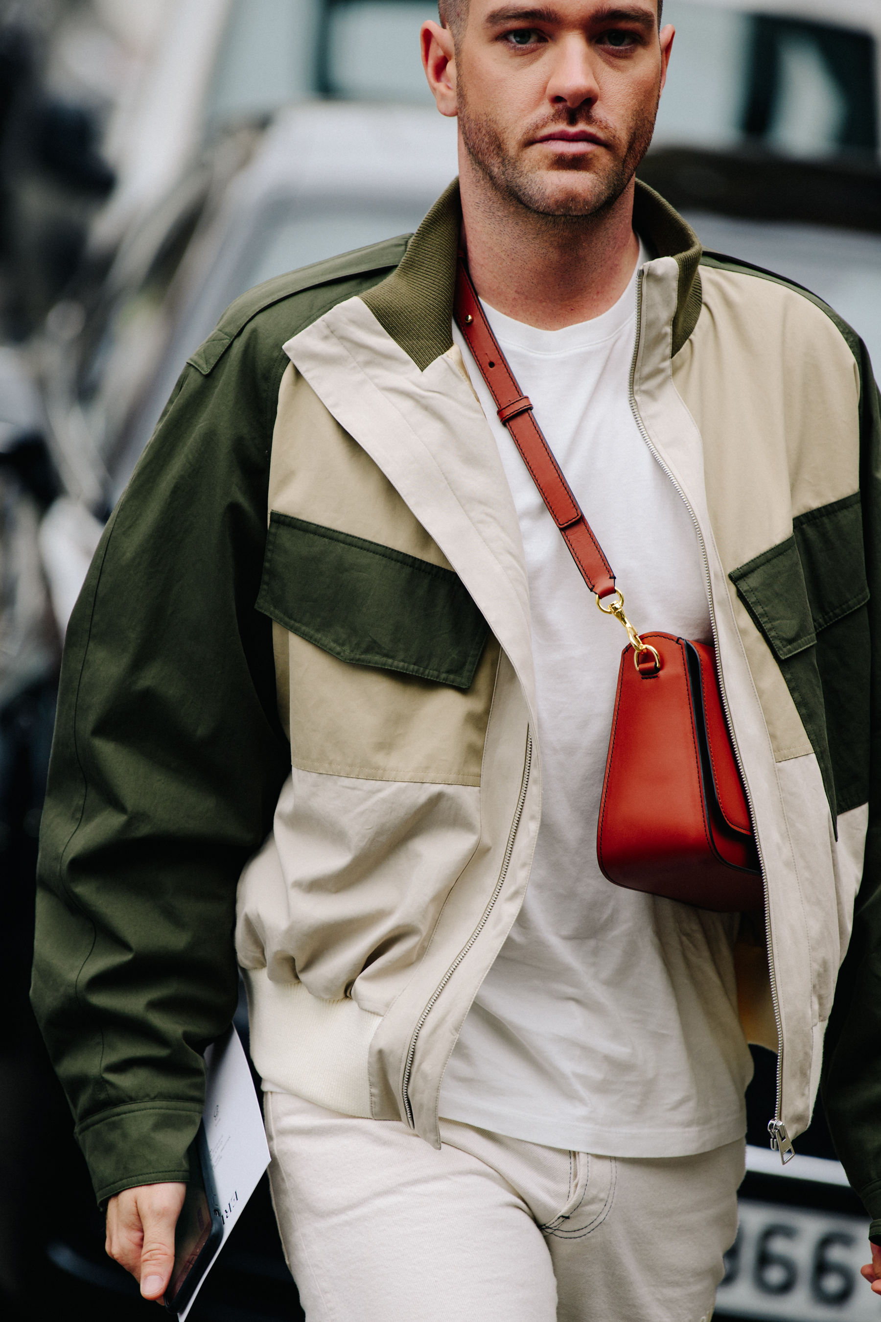 Man wearing green and white jacket