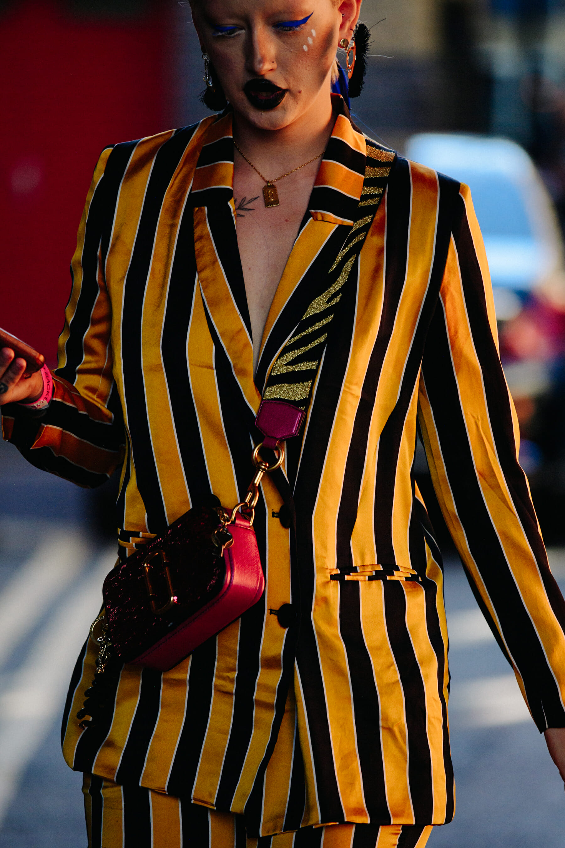 Woman wearing striped blazer
