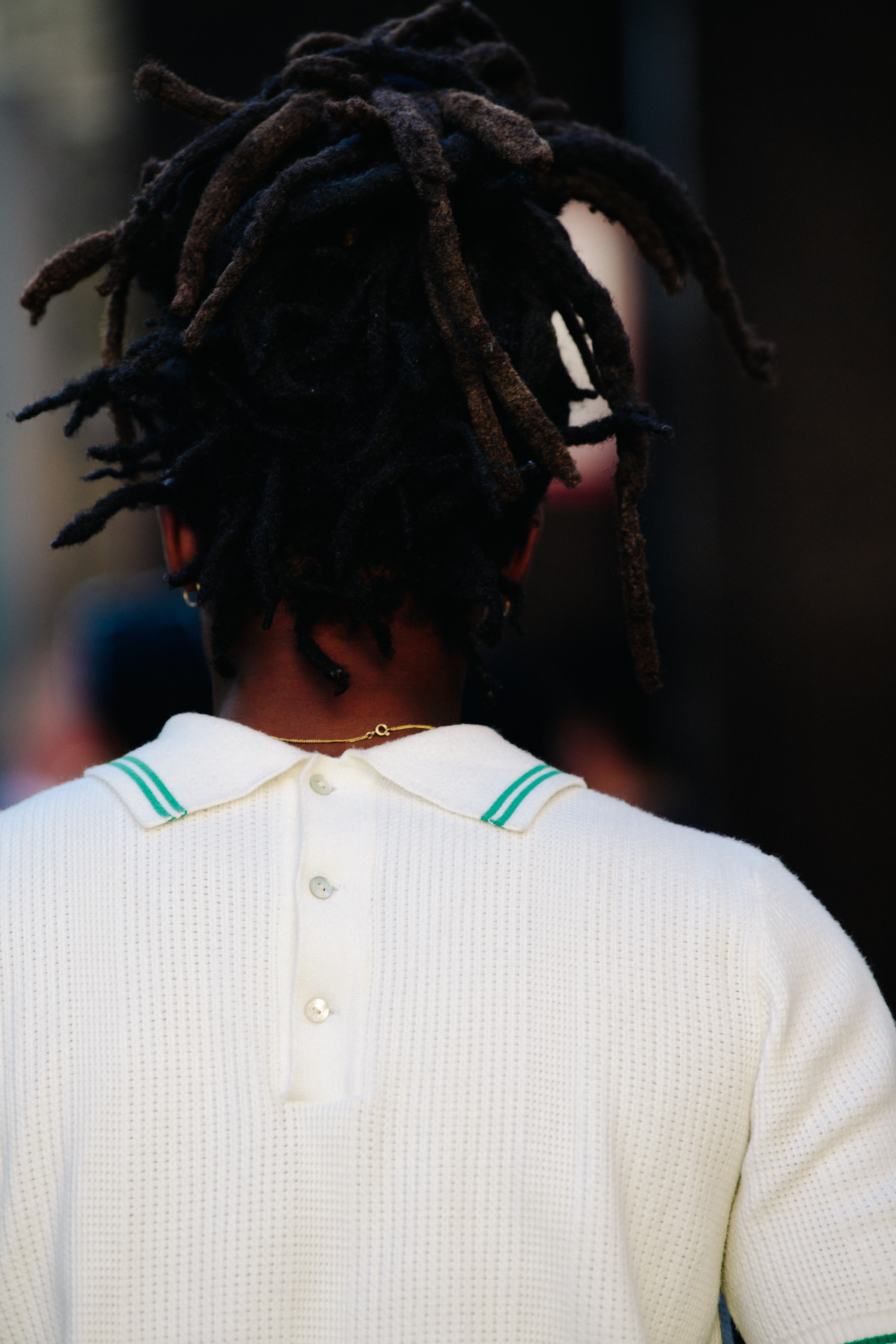 Man wearing backwards polo shirt
