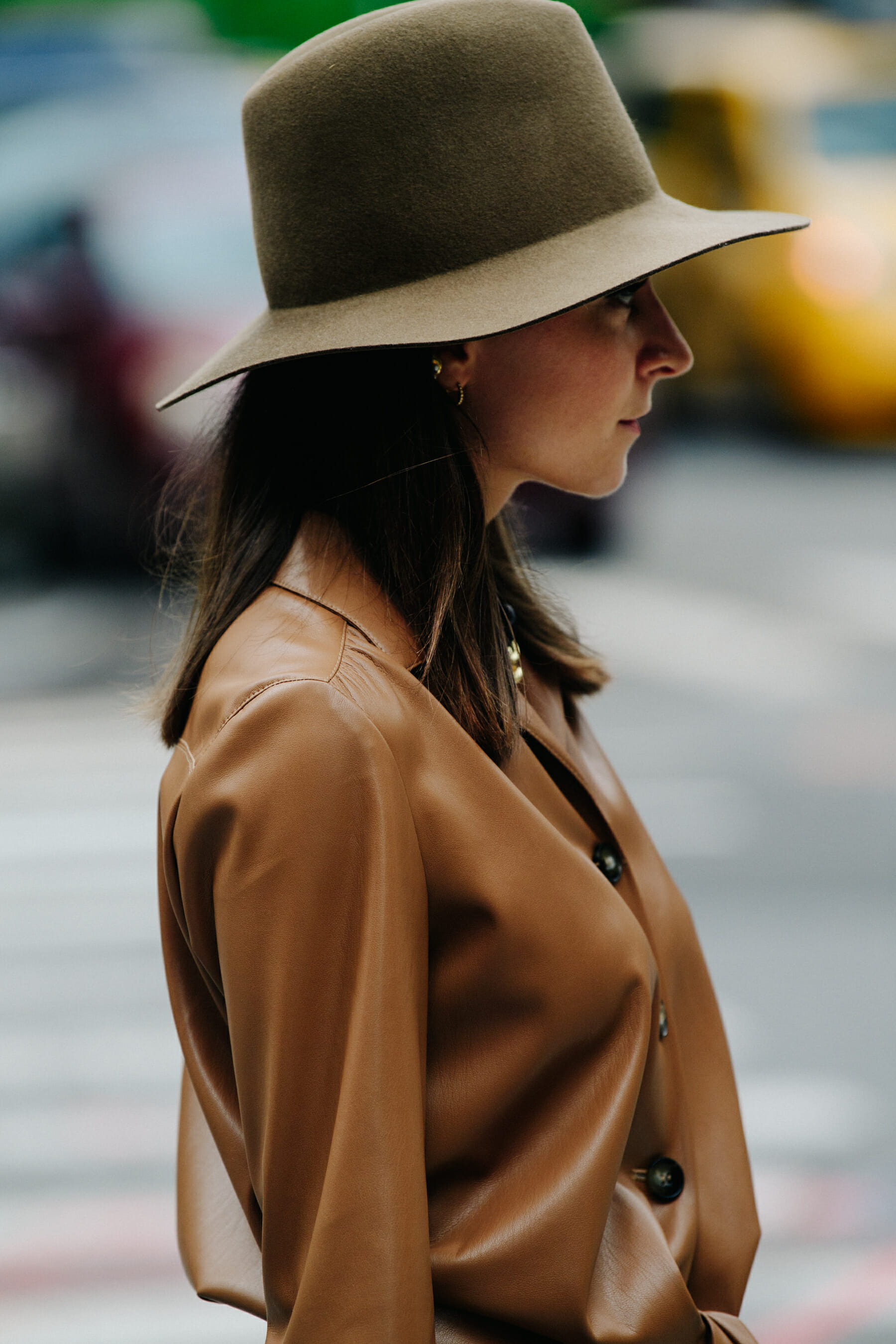 Woman wearing brown leather jacket
