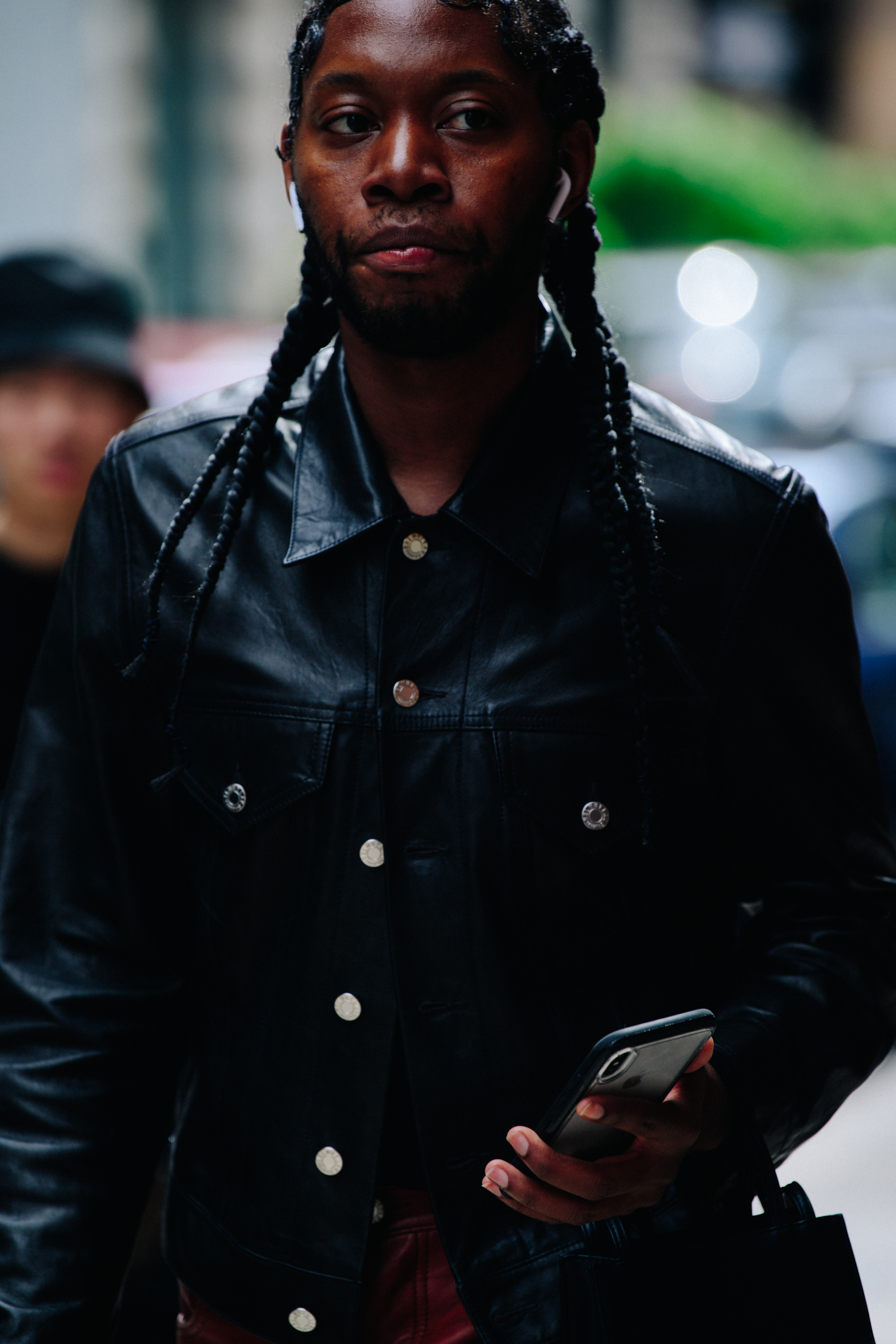 Man wearing black leather jacket