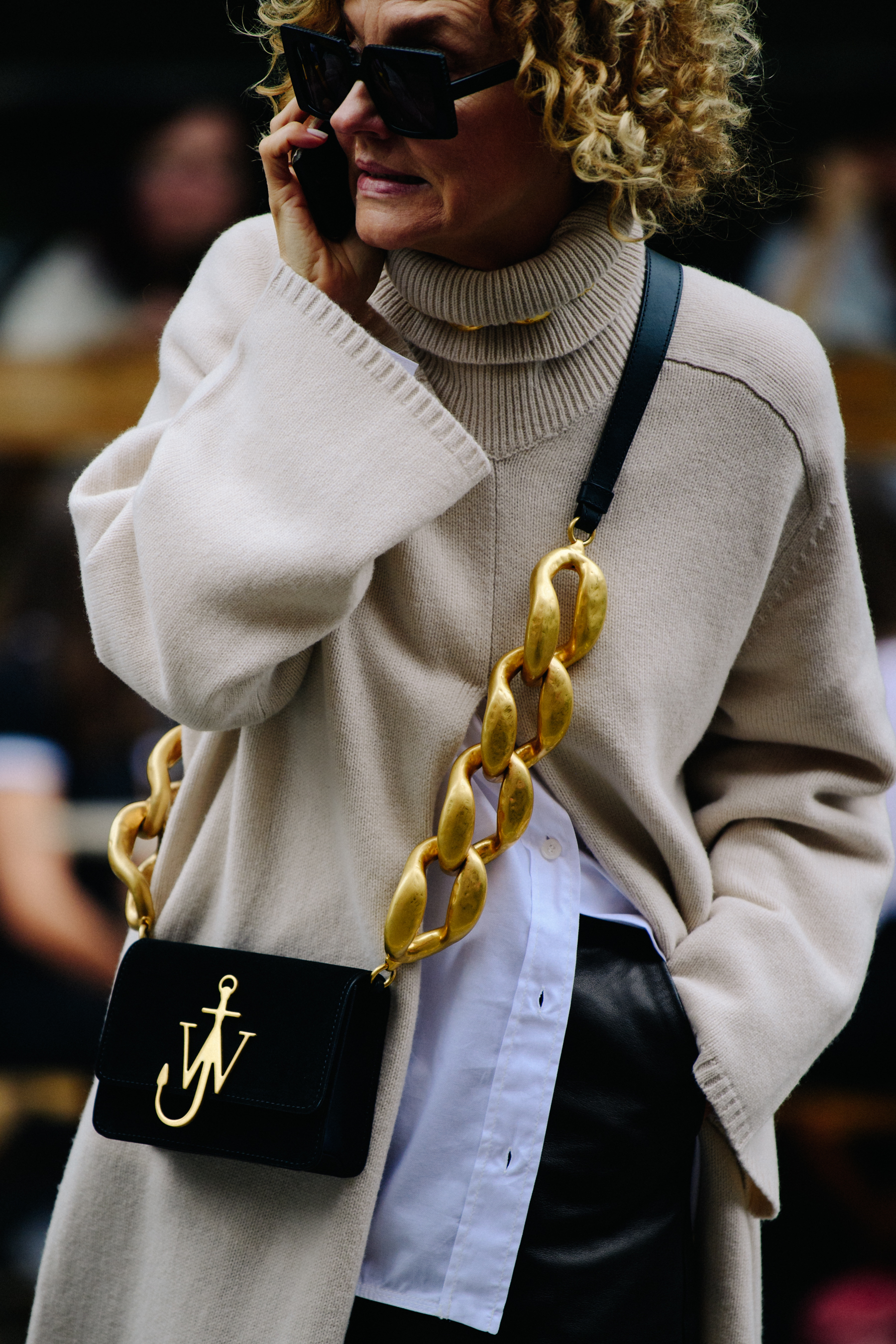 Woman wearing JW Anderson bag