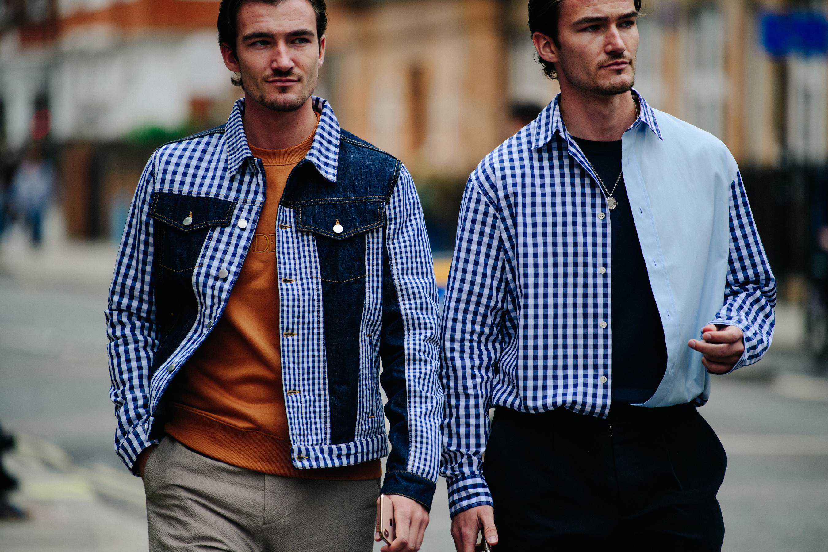 Two men wearing check