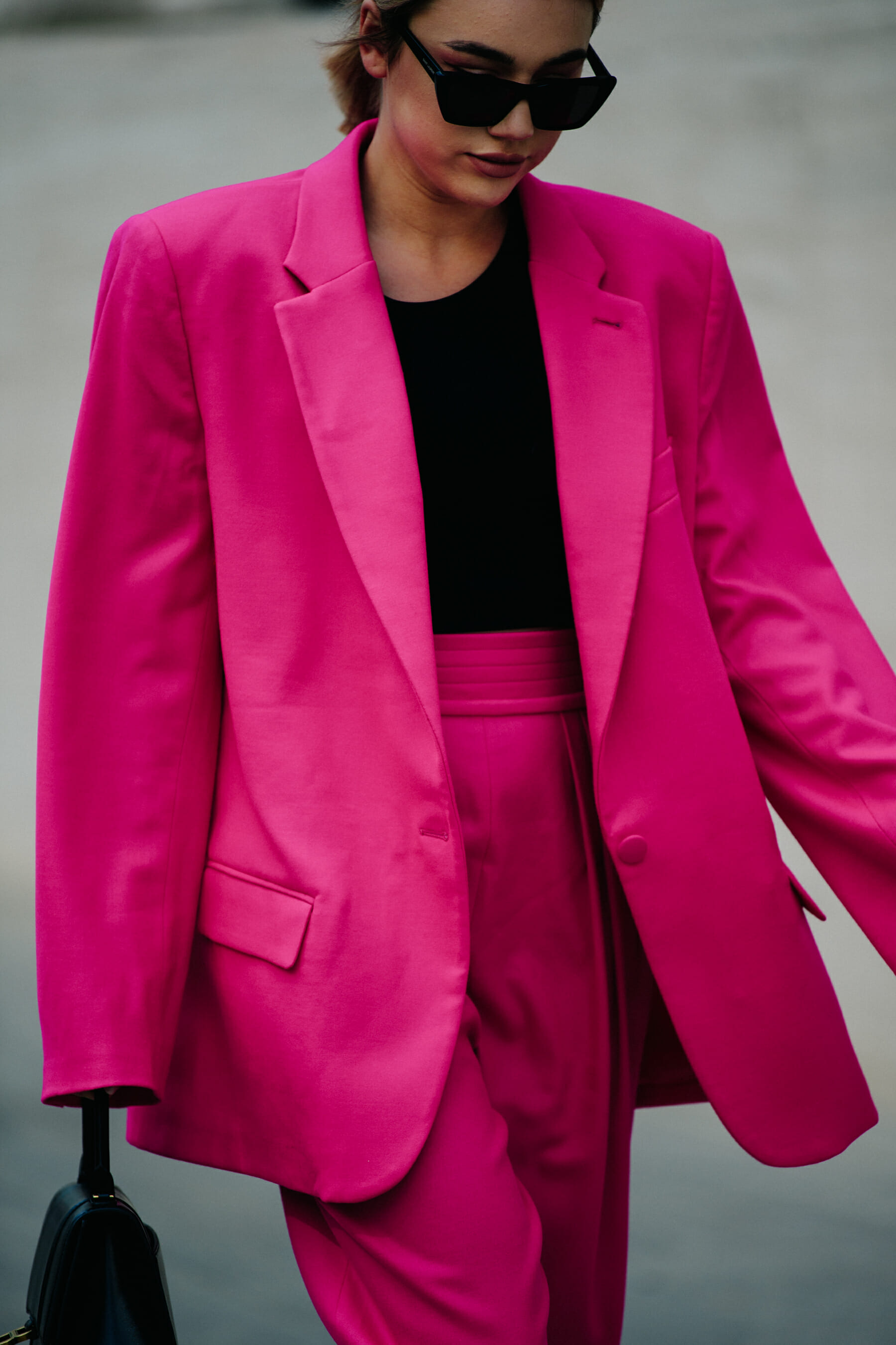 Woman wearing pink suit