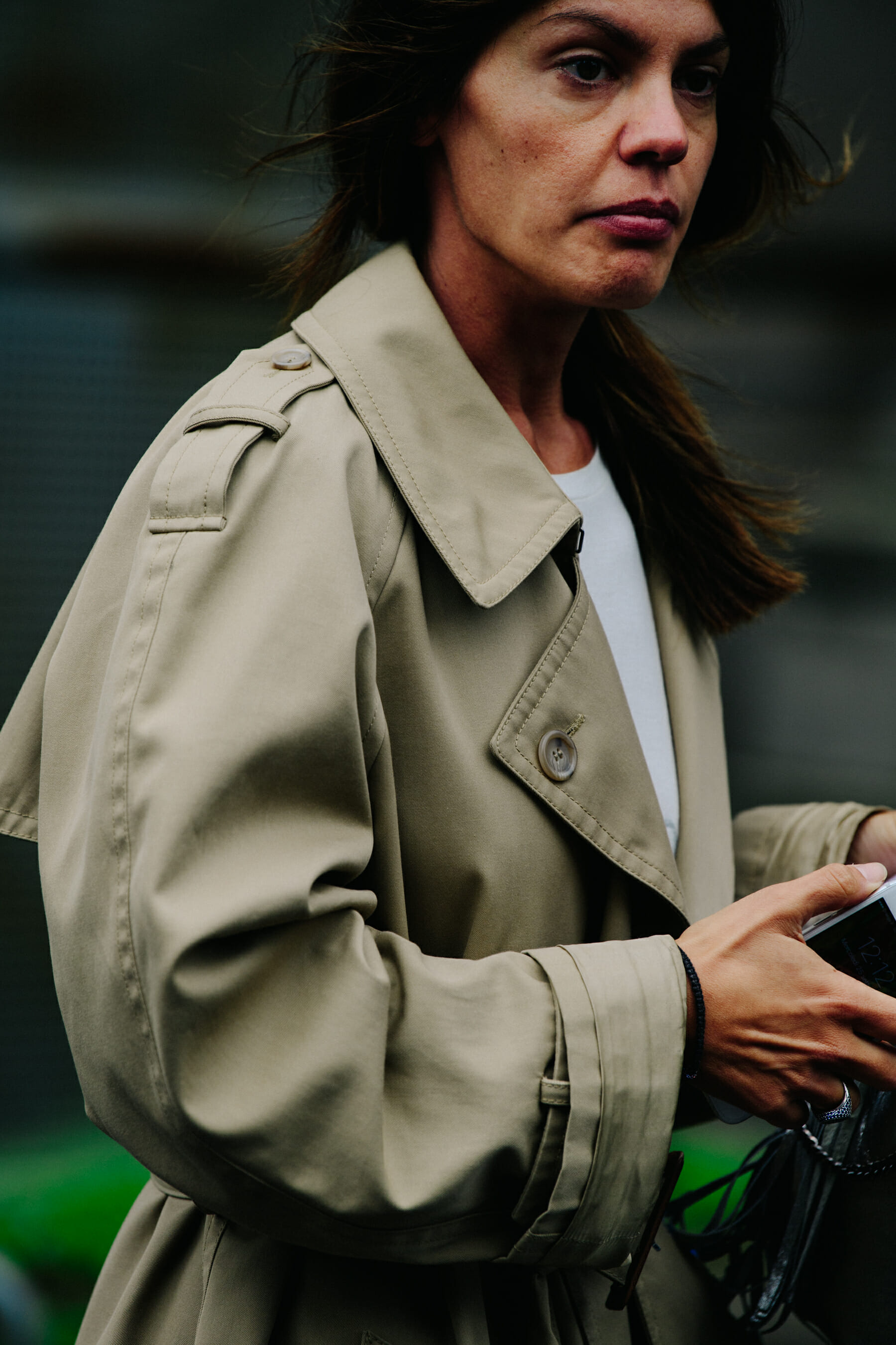 Woman wearing tan coat
