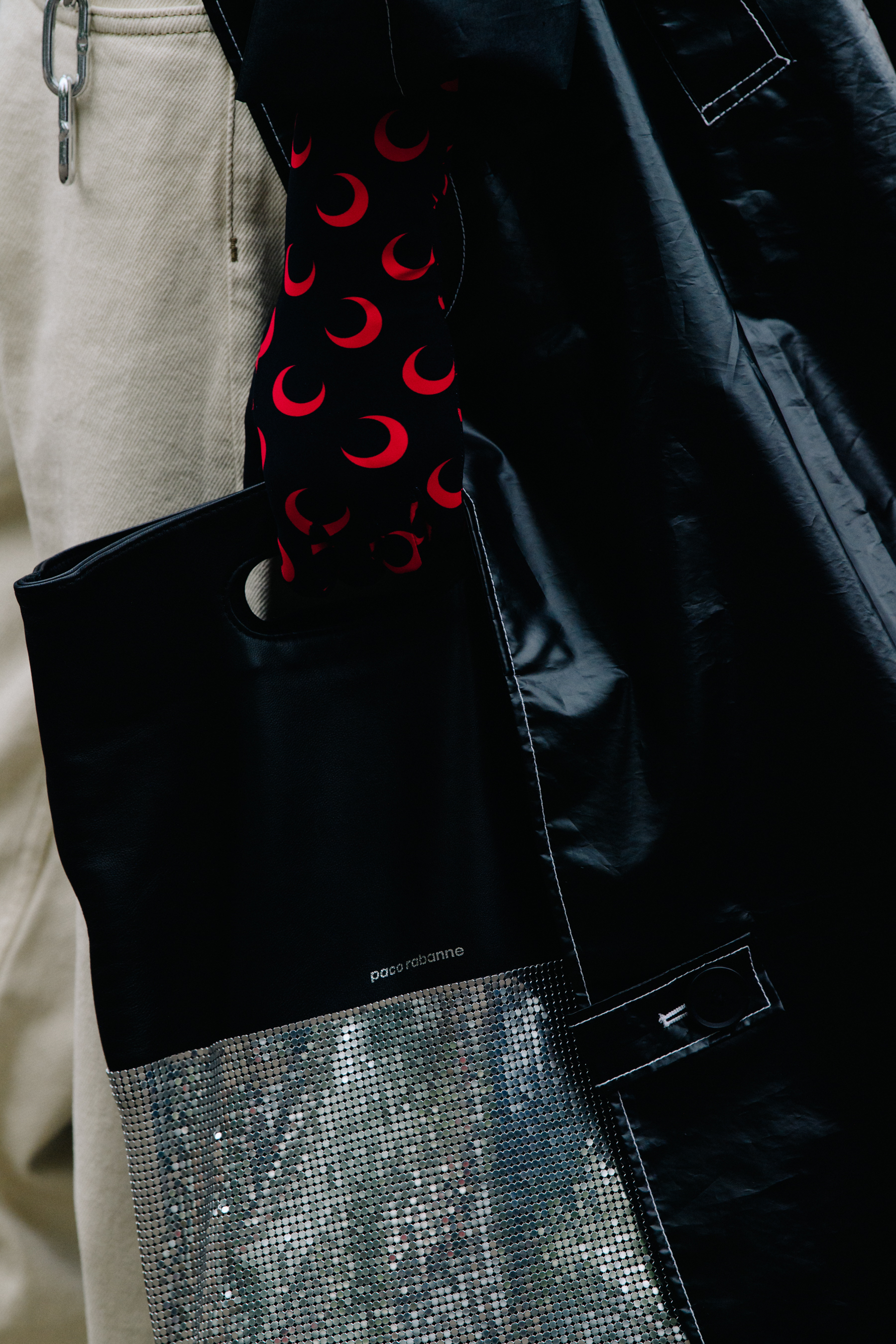 Woman carrying Paco Rabanne bag