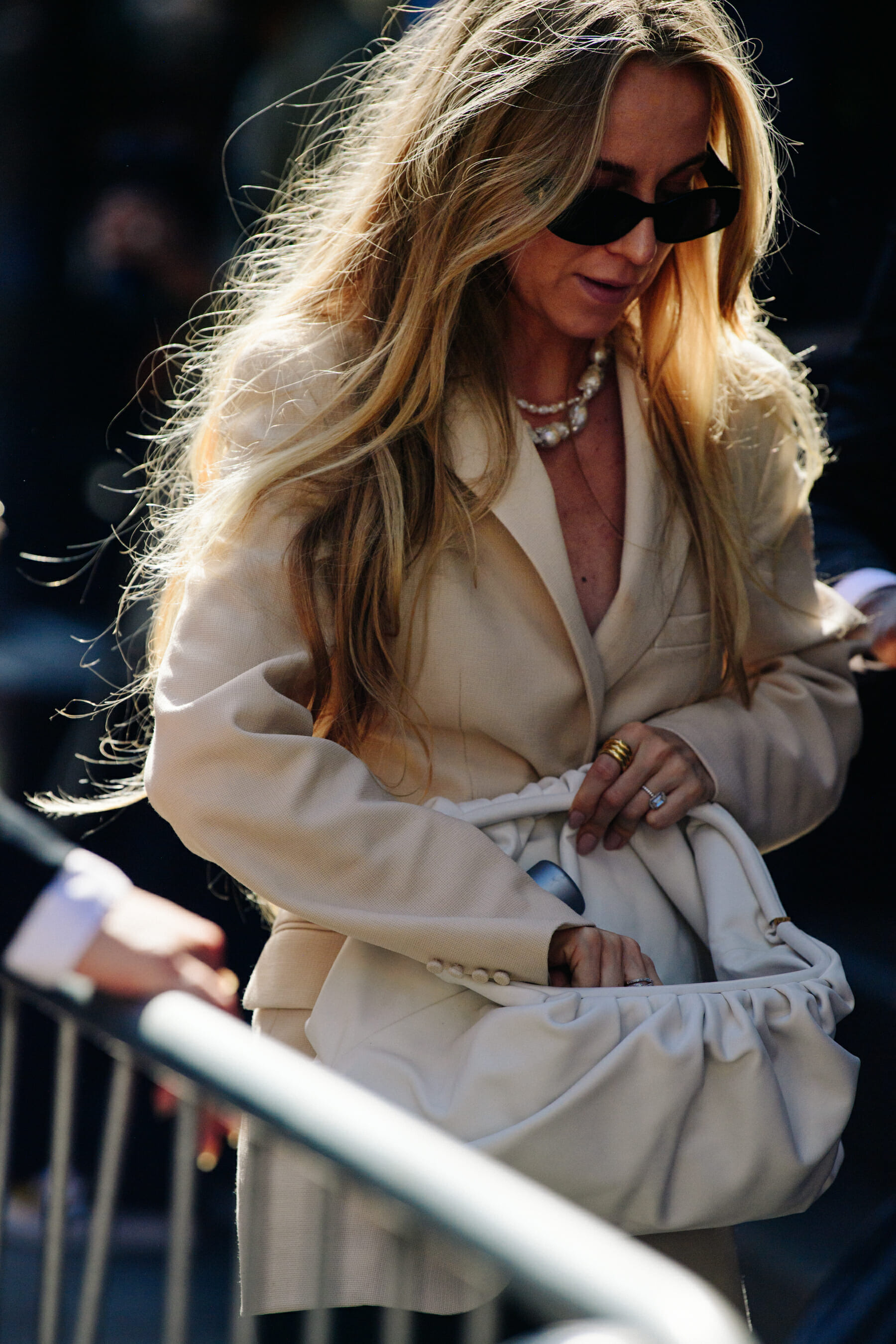 Woman wearing tan blazer