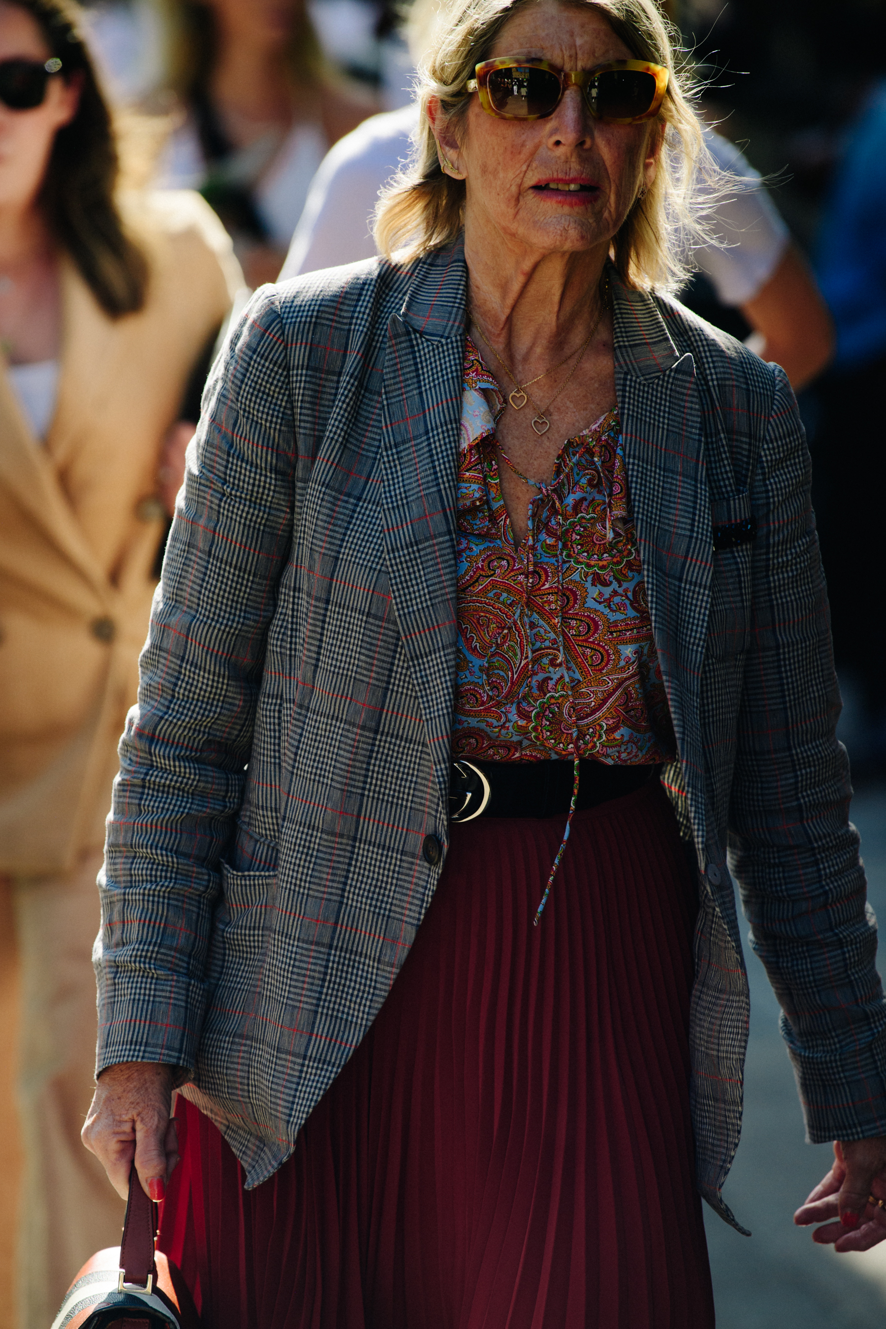 Woman wearing grey check blazer