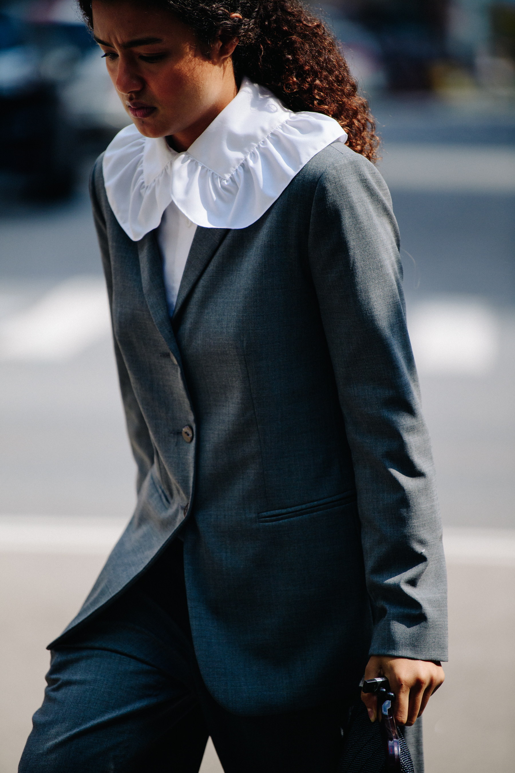 Woman wearing greey suit