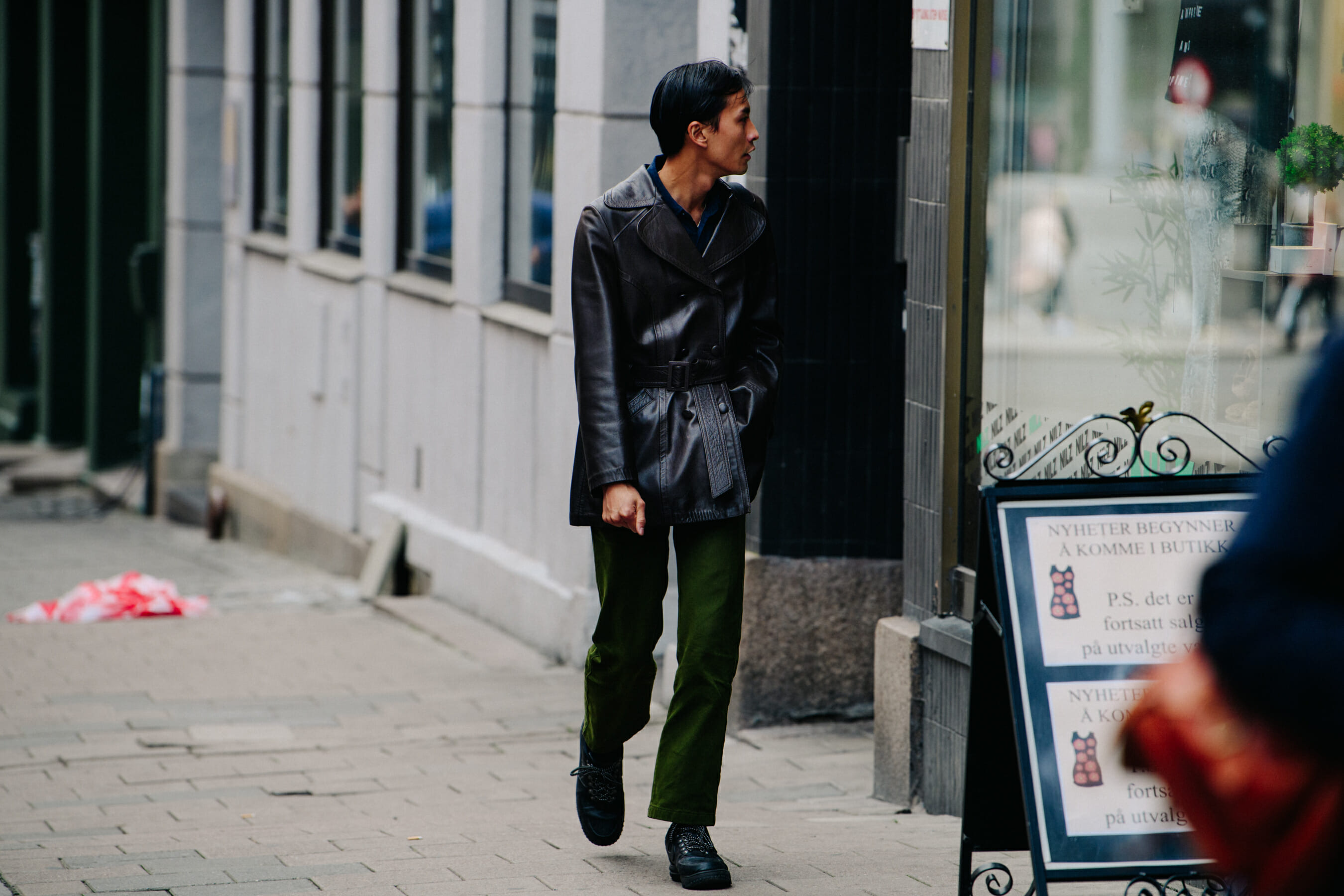 Man wearing brown leather jacket